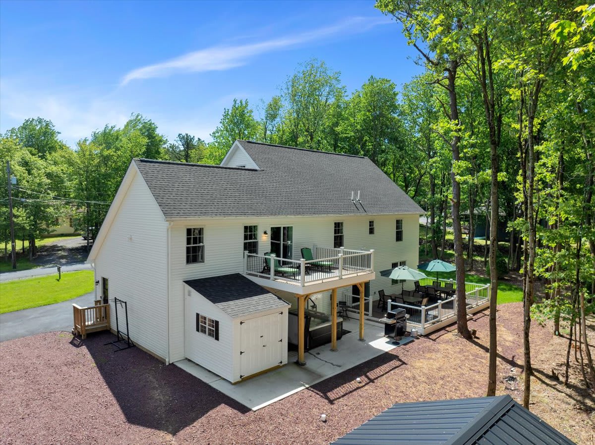 Beautiful Property Exterior with Private Hot Tub on Deck