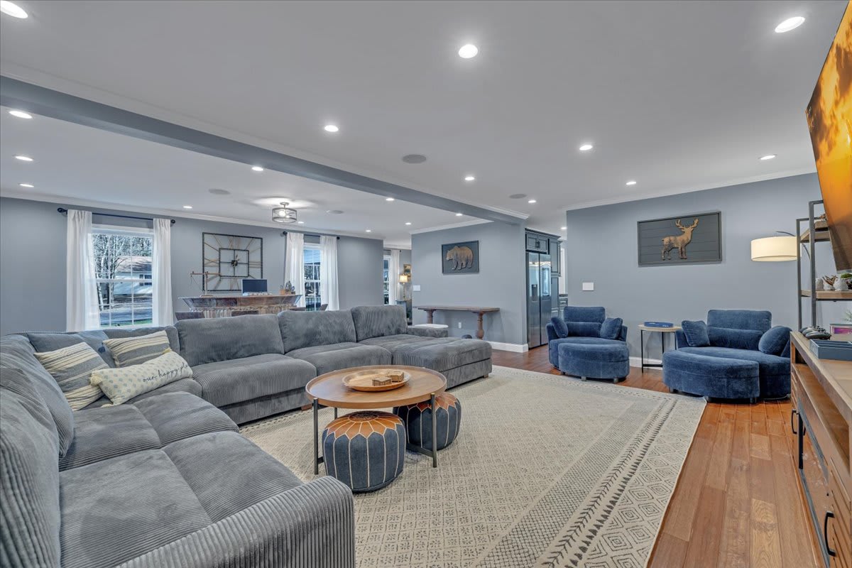 Spacious Open Floor Plan Living Room with Vaulted Ceilings