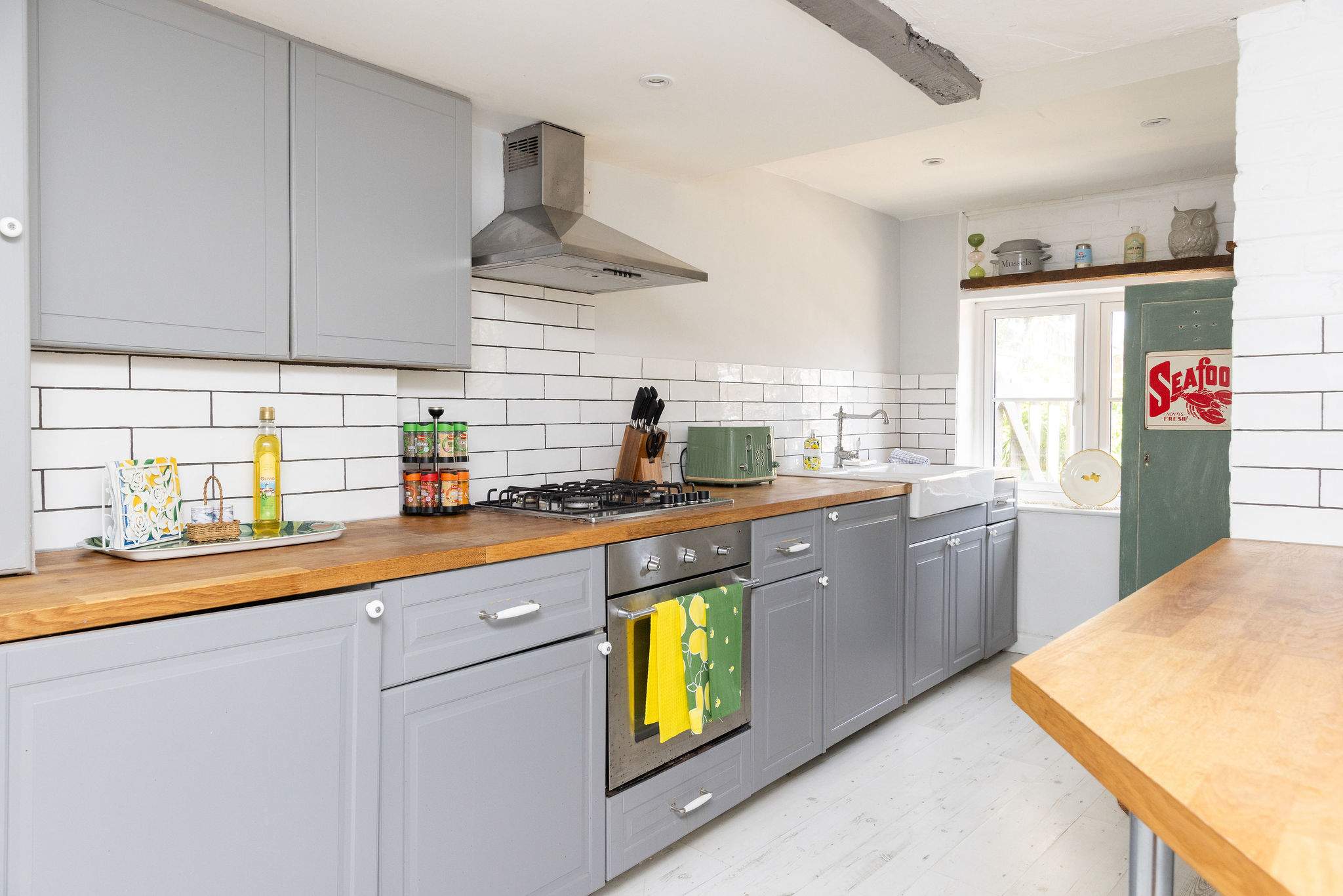 The cottage has a stylish & colourful kitchen.