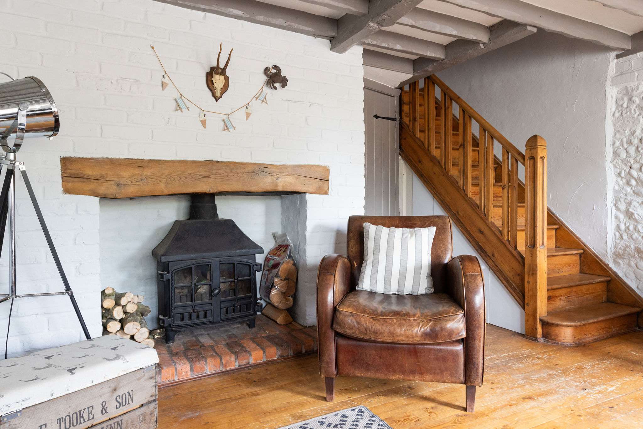 Full of character features throughout, such as exposed beams, wooden floors and staircase!