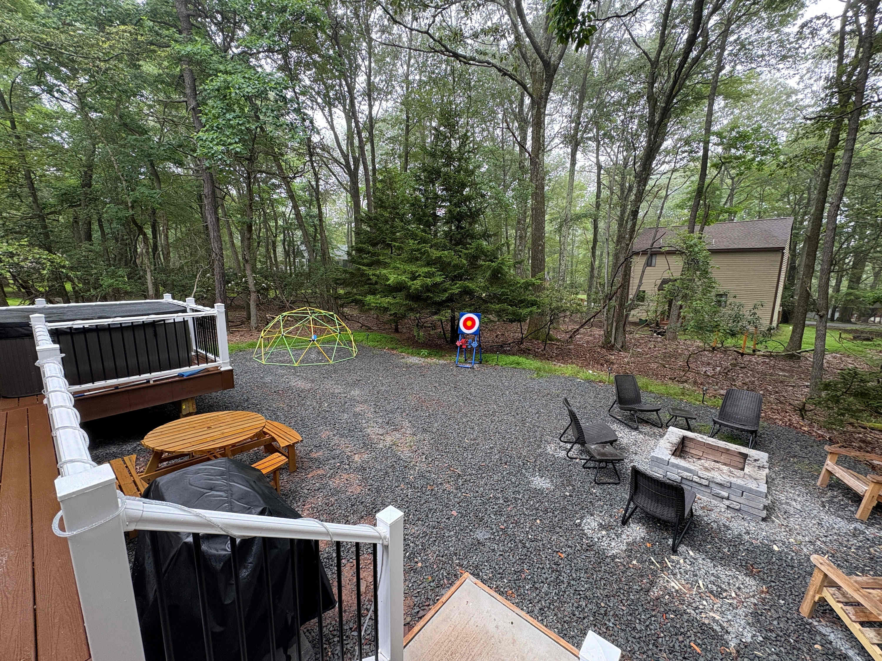 Enjoy the multi-level deck surrounded by peaceful wooded views