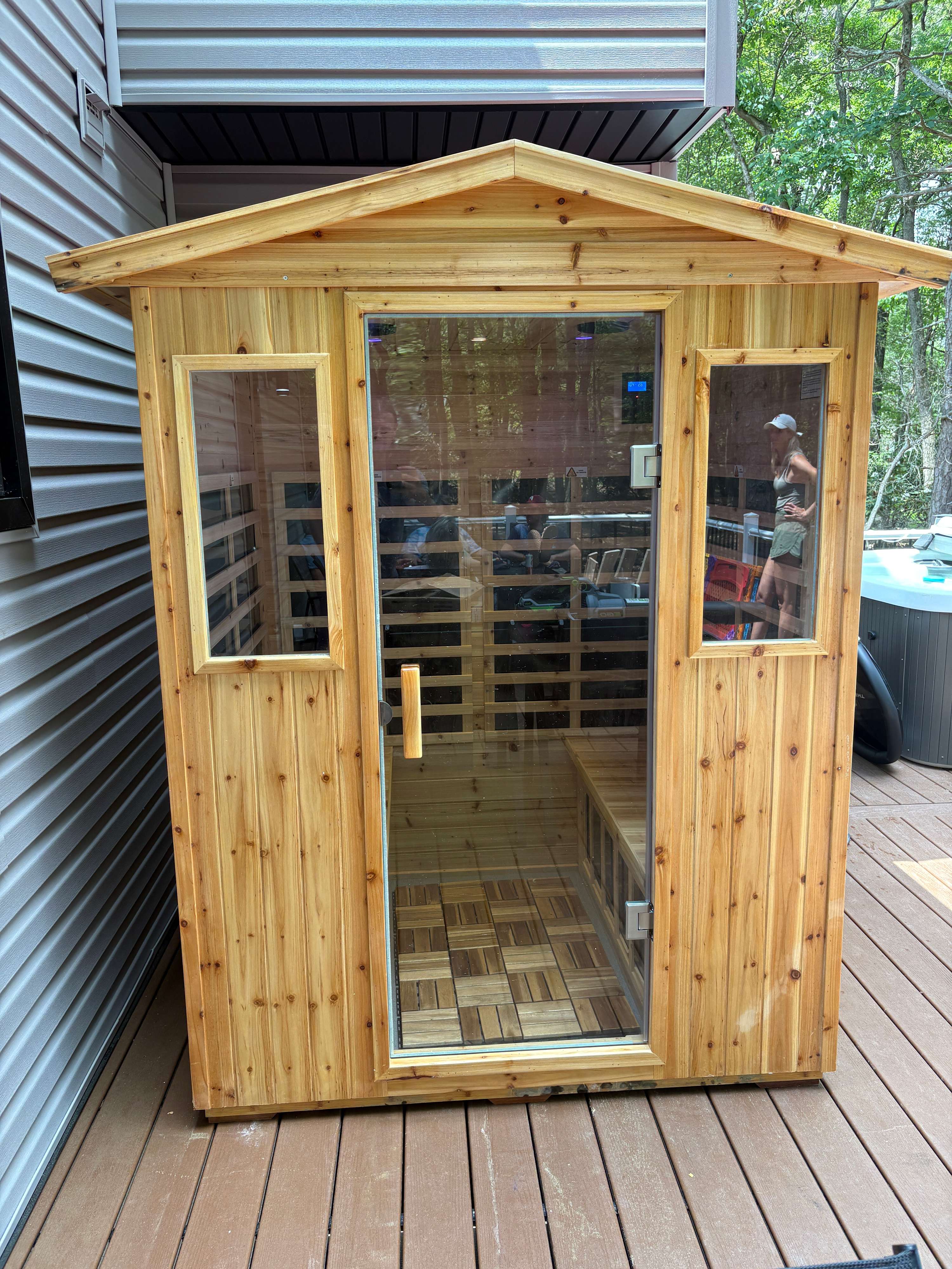 The outdoor sauna offers a perfect spot to warm up and relax