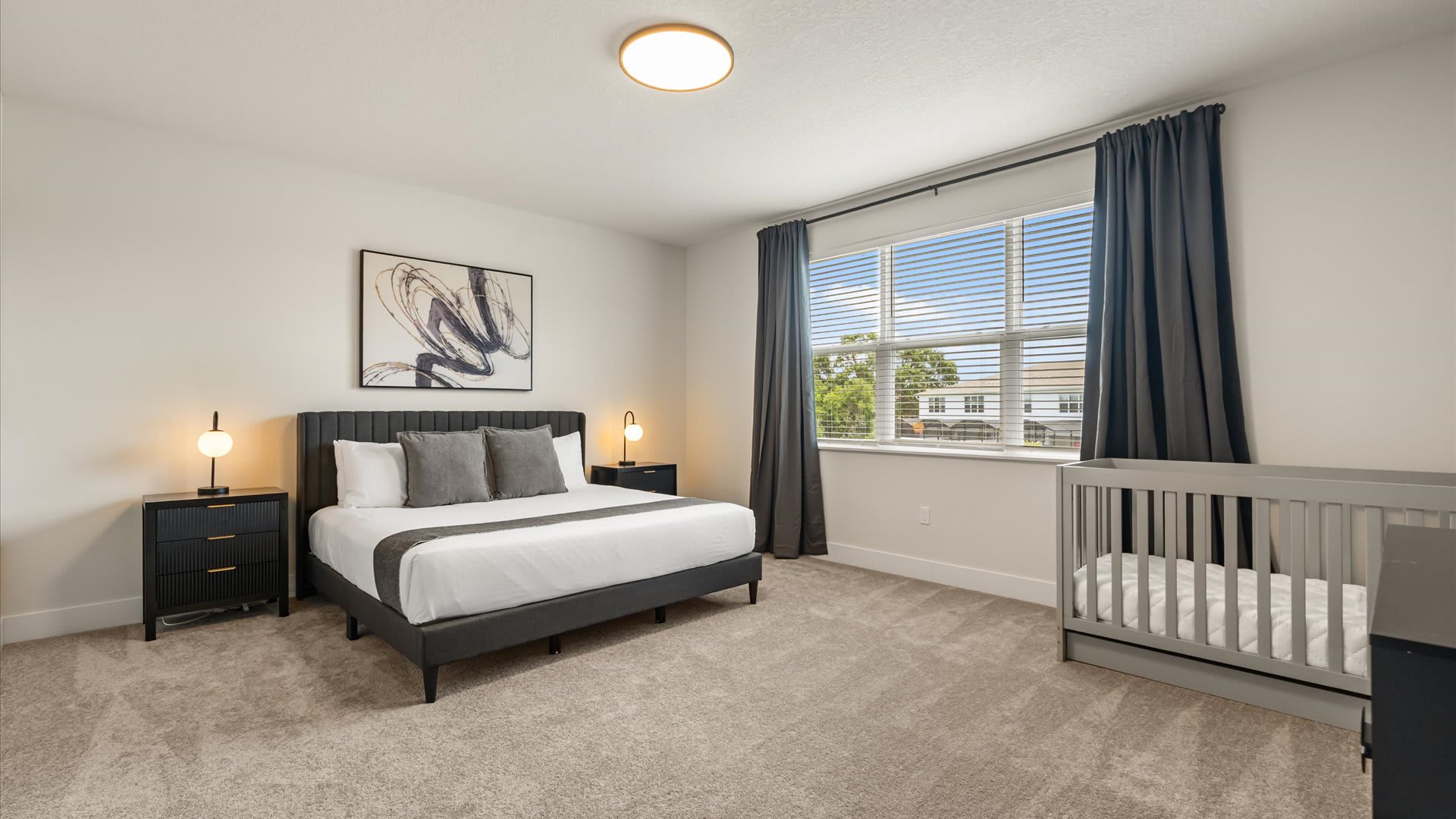 Master bedroom with baby cot