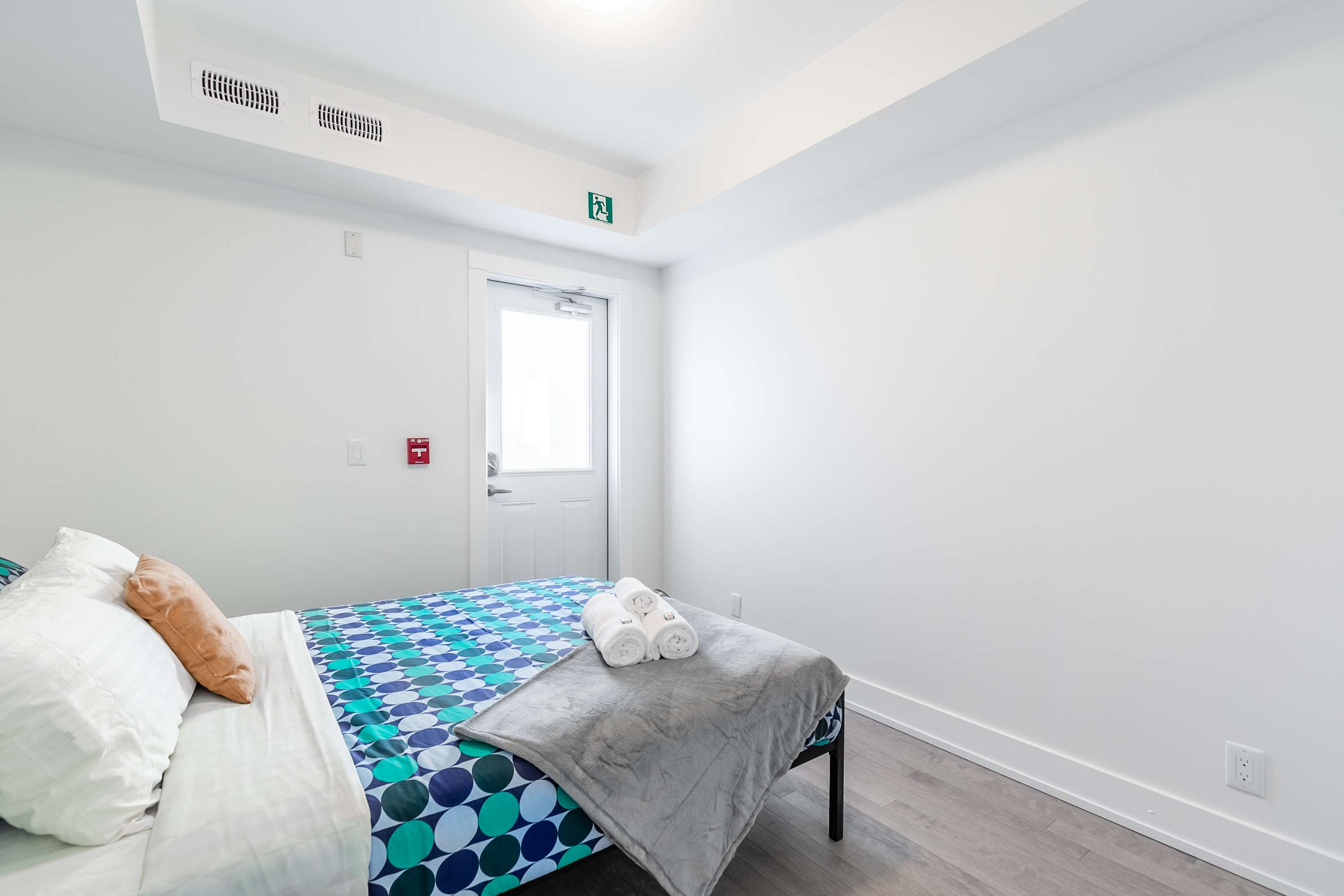 Second bedroom with a double bed and fresh linens