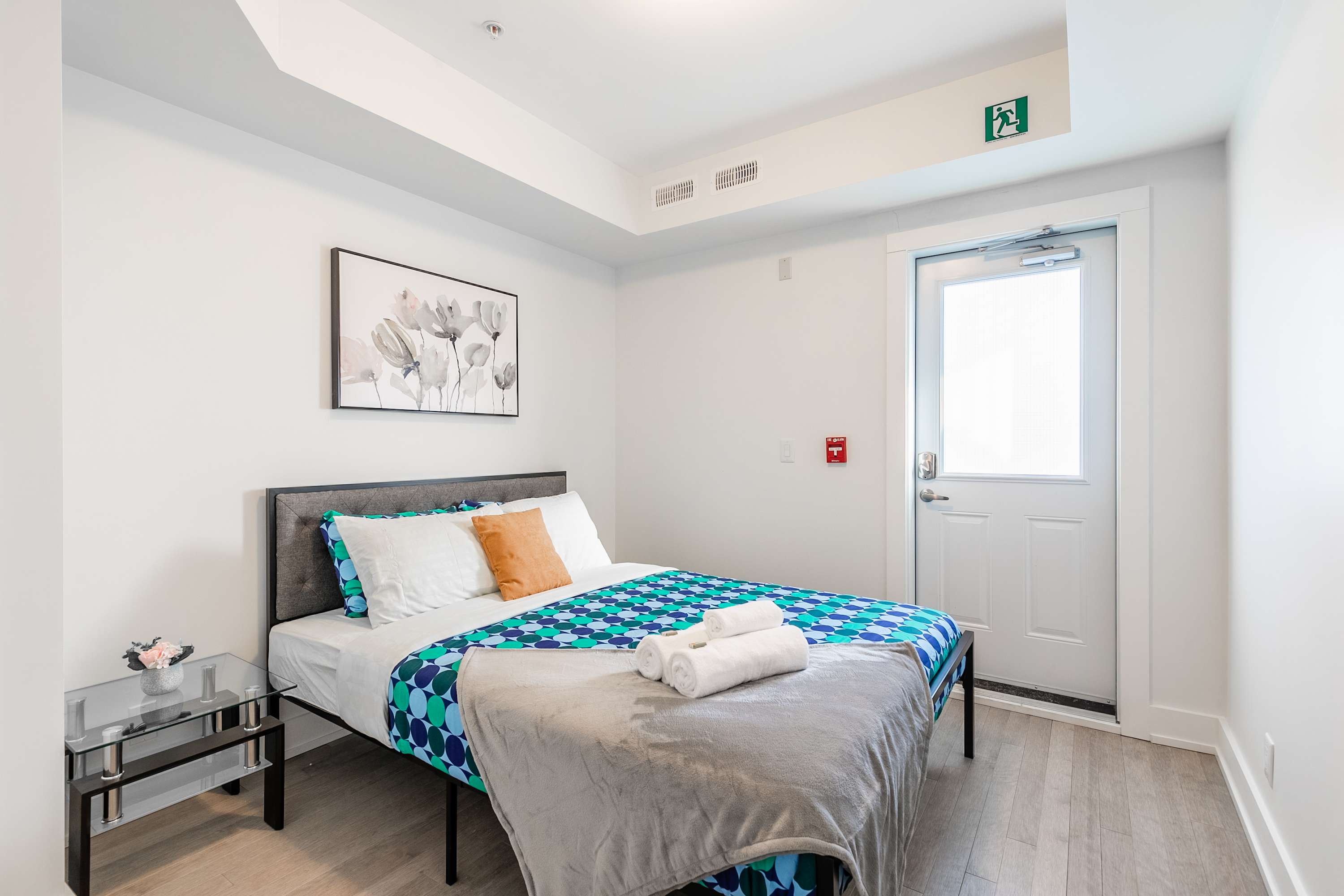 Second bedroom with a double bed and fresh linens