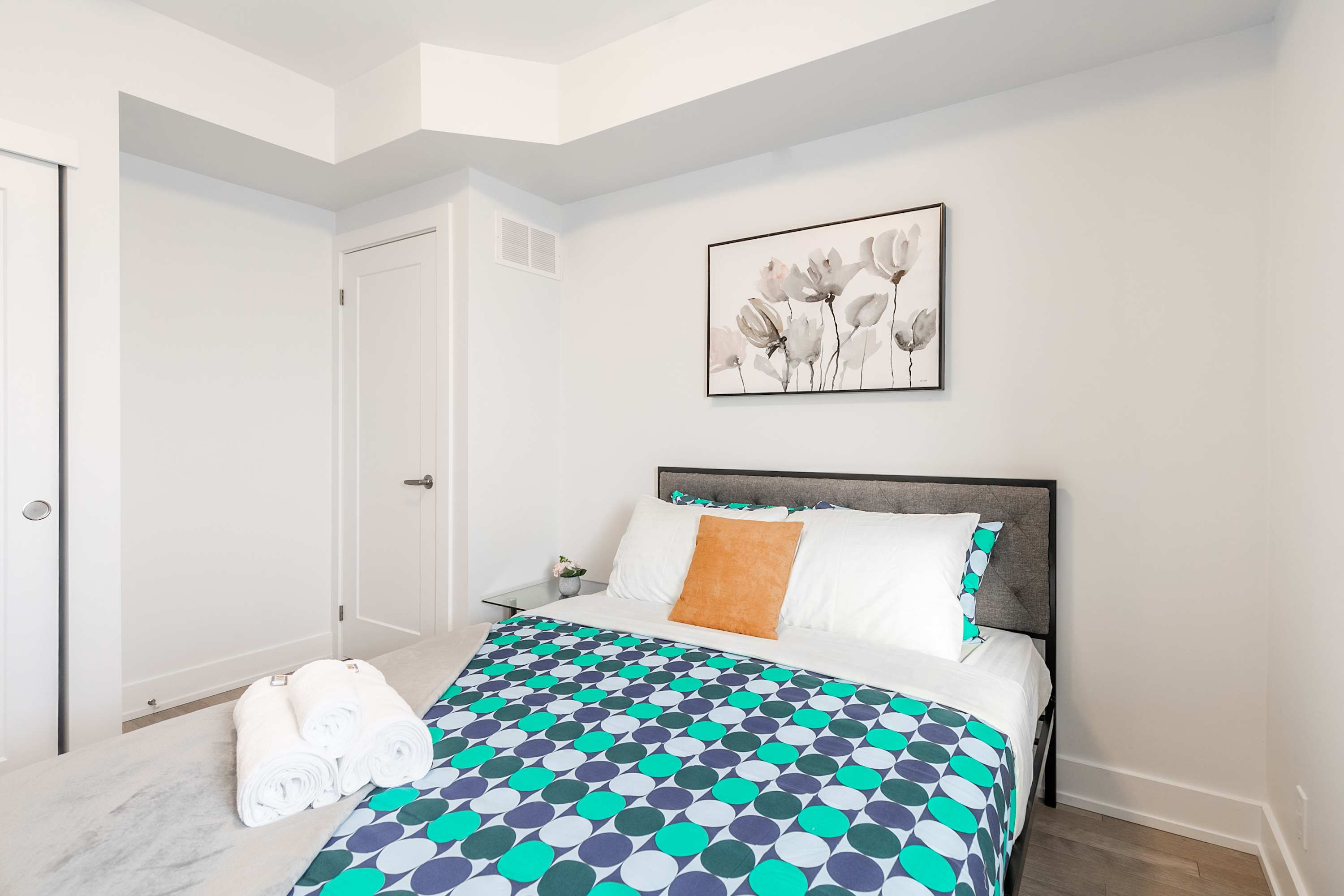 Second bedroom with a double bed and fresh linens