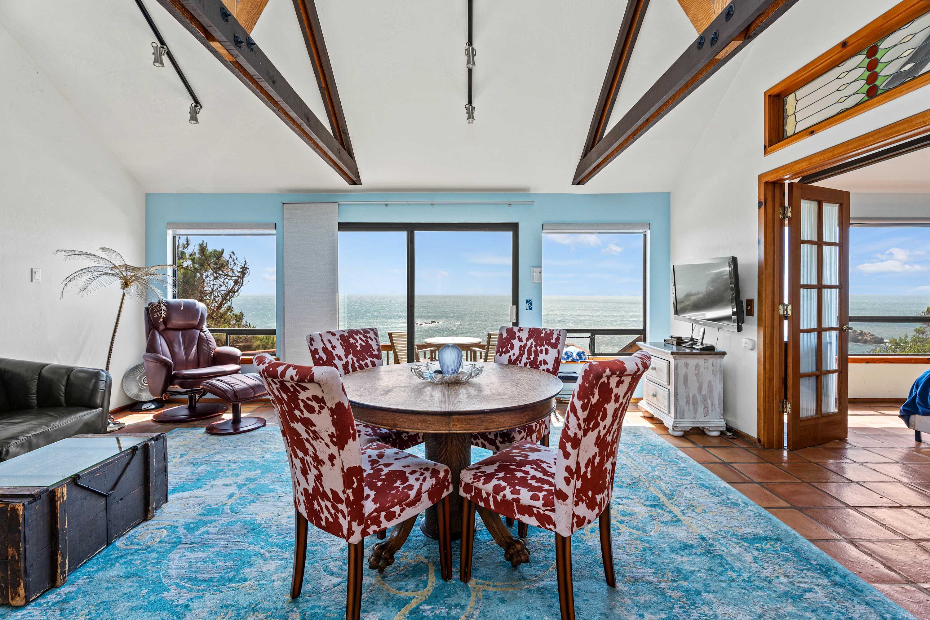 Vaulted ceilings and picture windows let the light pour in