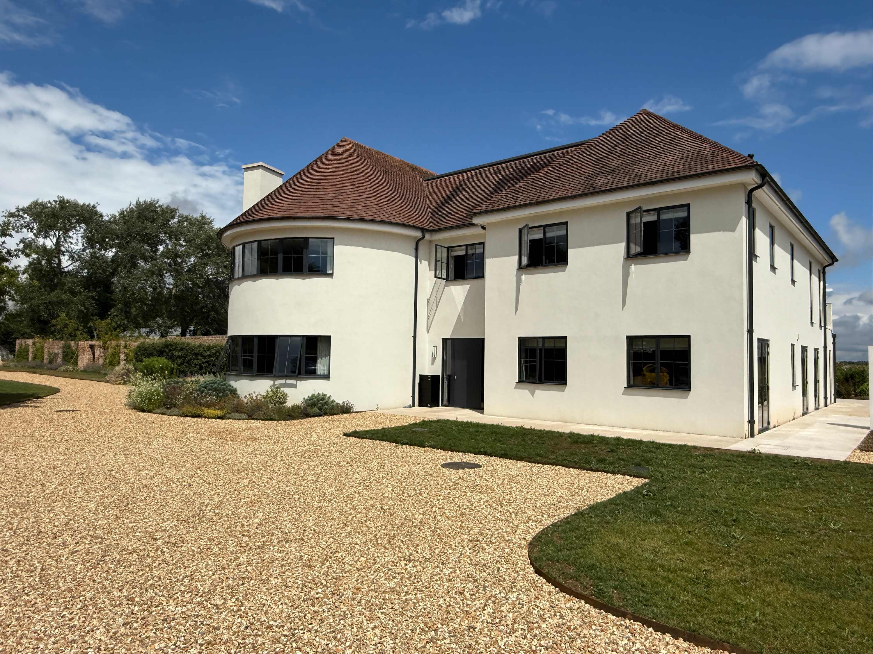 Striking newly built 8-bed home with private driveway