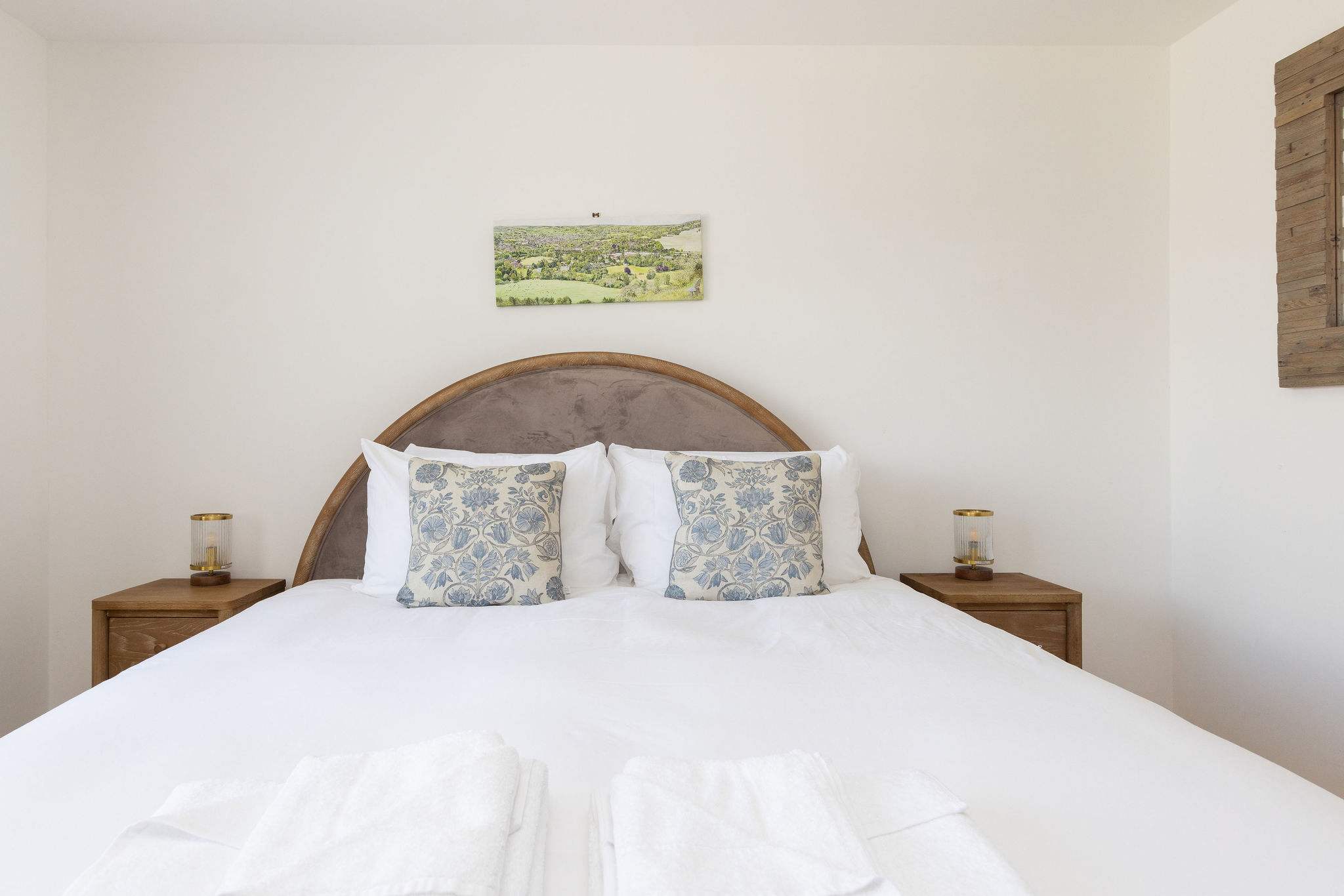 Master bedroom with super king bed and soft linens