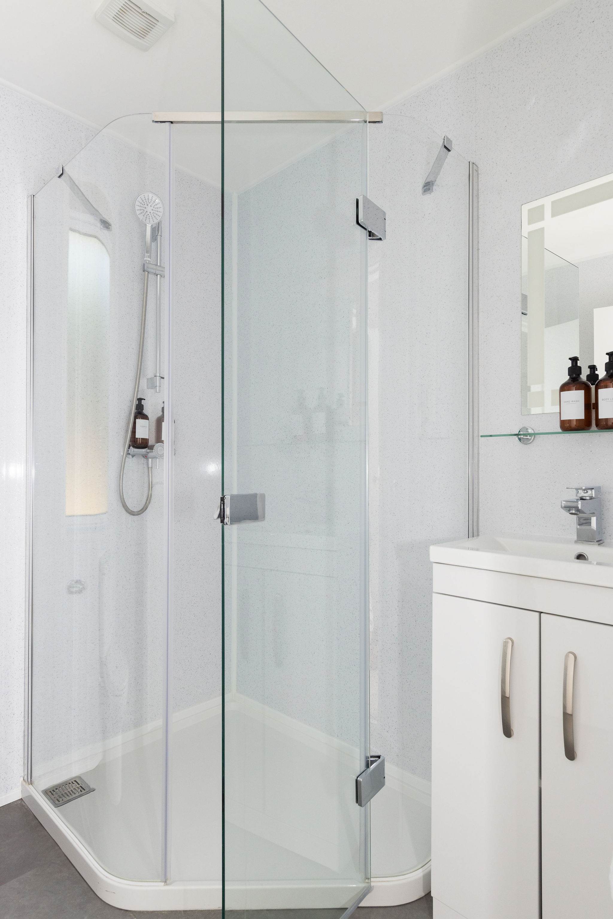 Bright en suite with walk-in shower and toilet