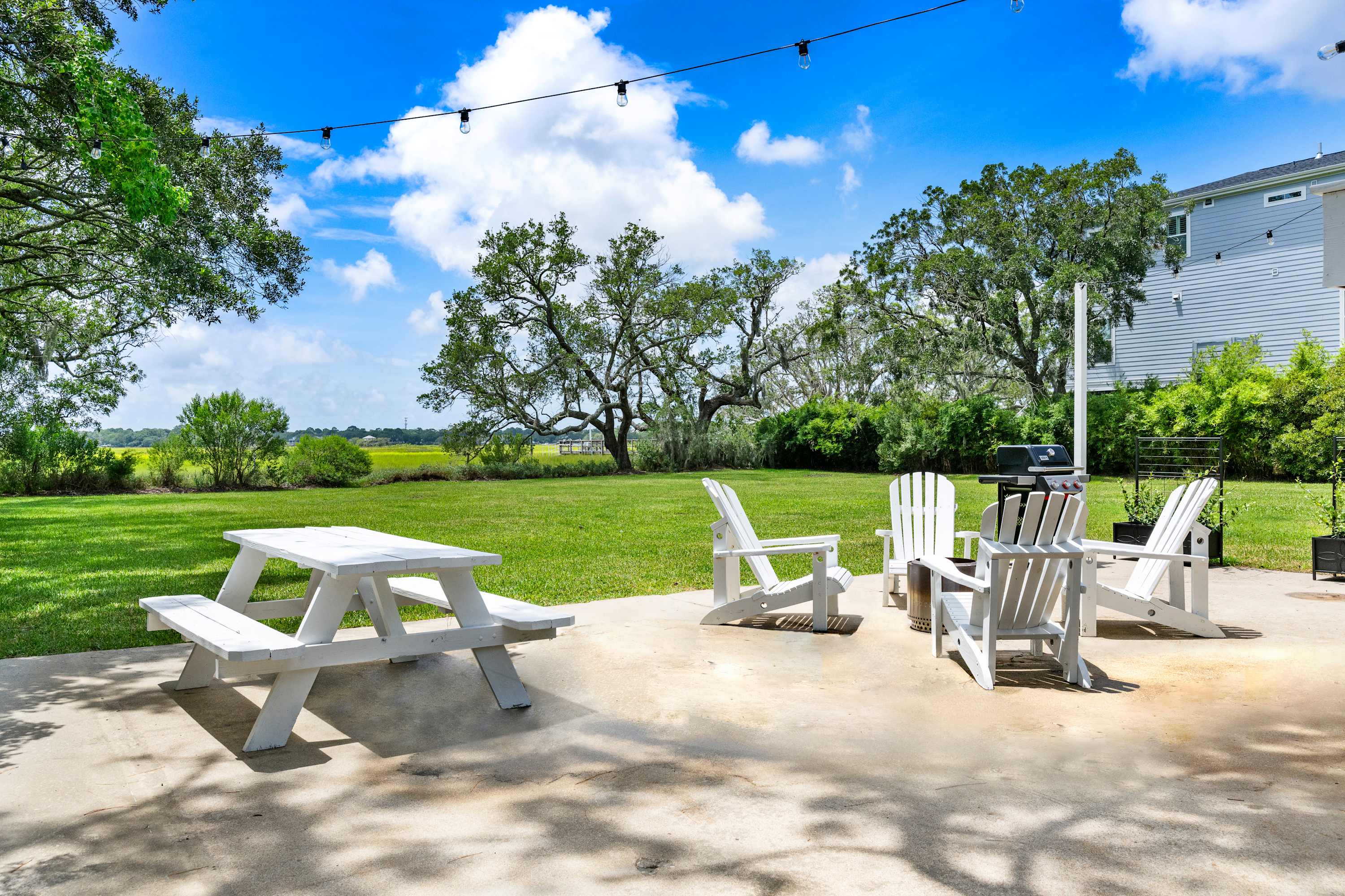 Plenty of seating on the patio with endless views of the creek and marsh!