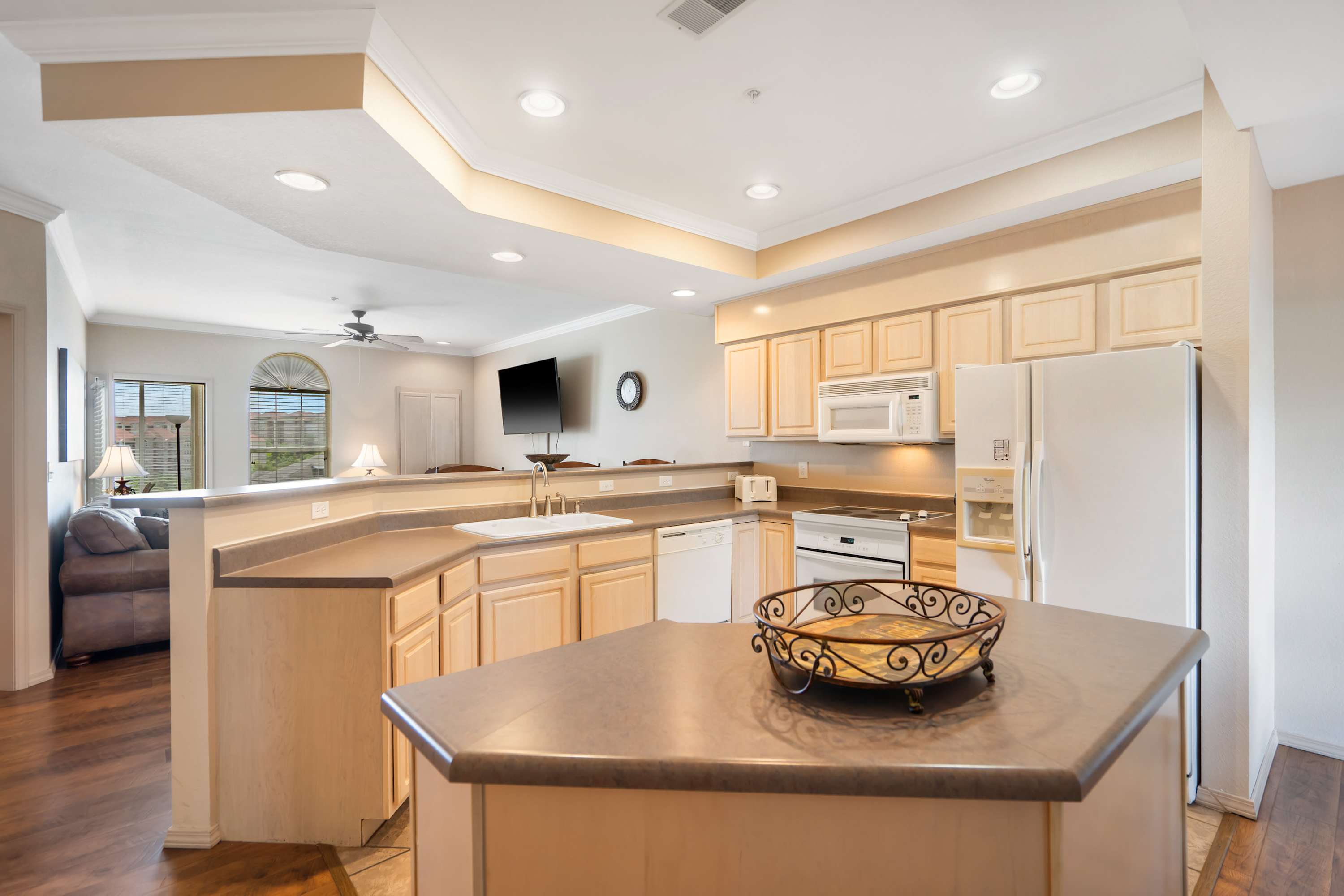 The open, airy kitchen offers ample space & every home comfort​
