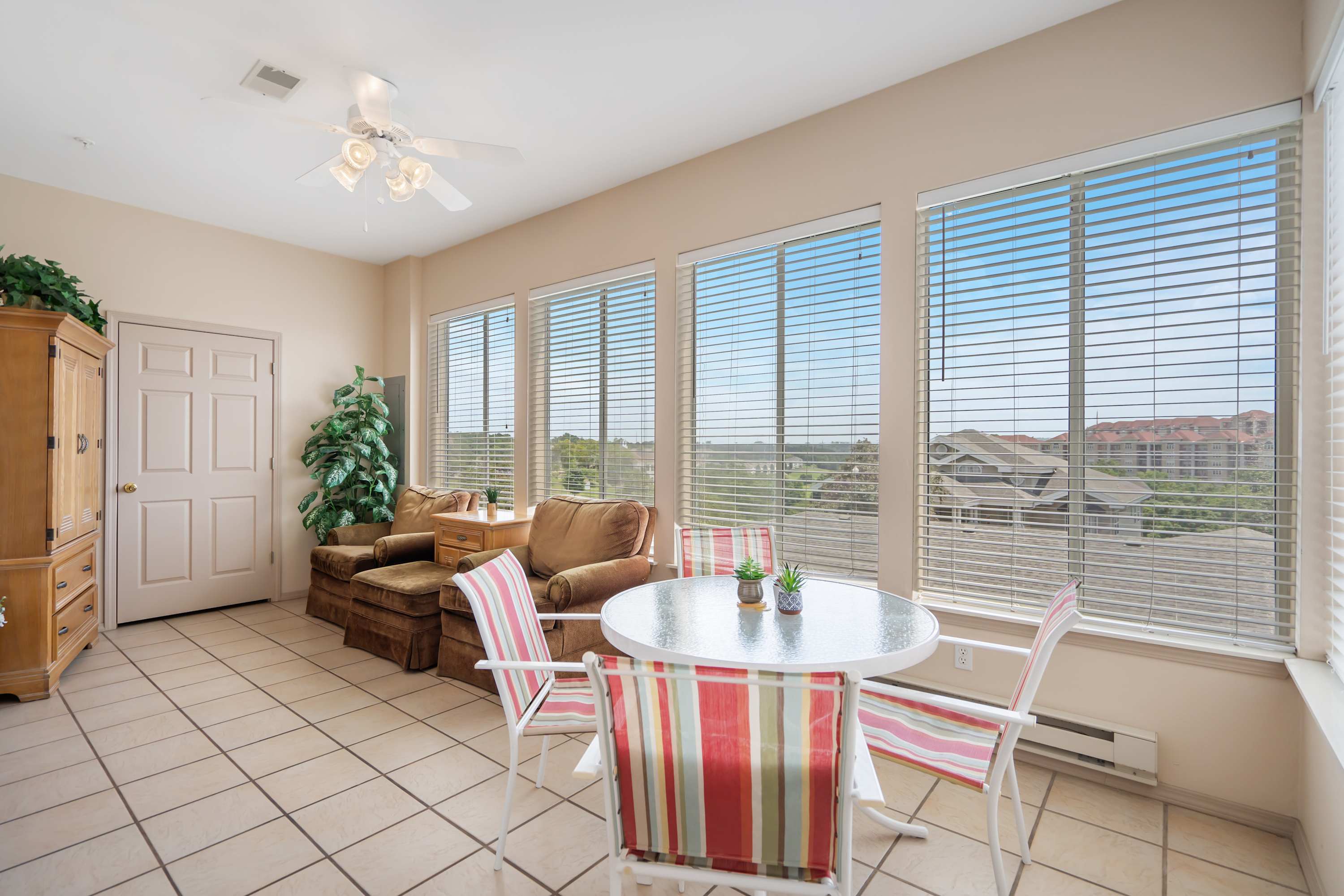 Lounge the day away with sweeping views in the sunroom​