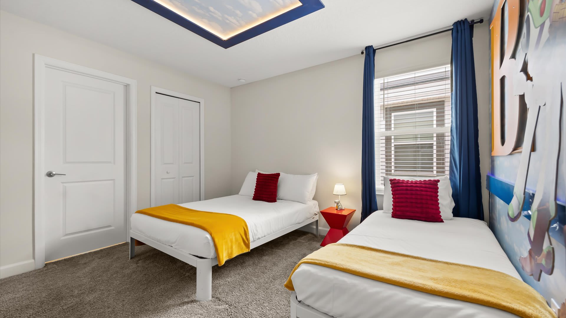 Toy Story-themed bedroom with 1 double bed and 1 single bed