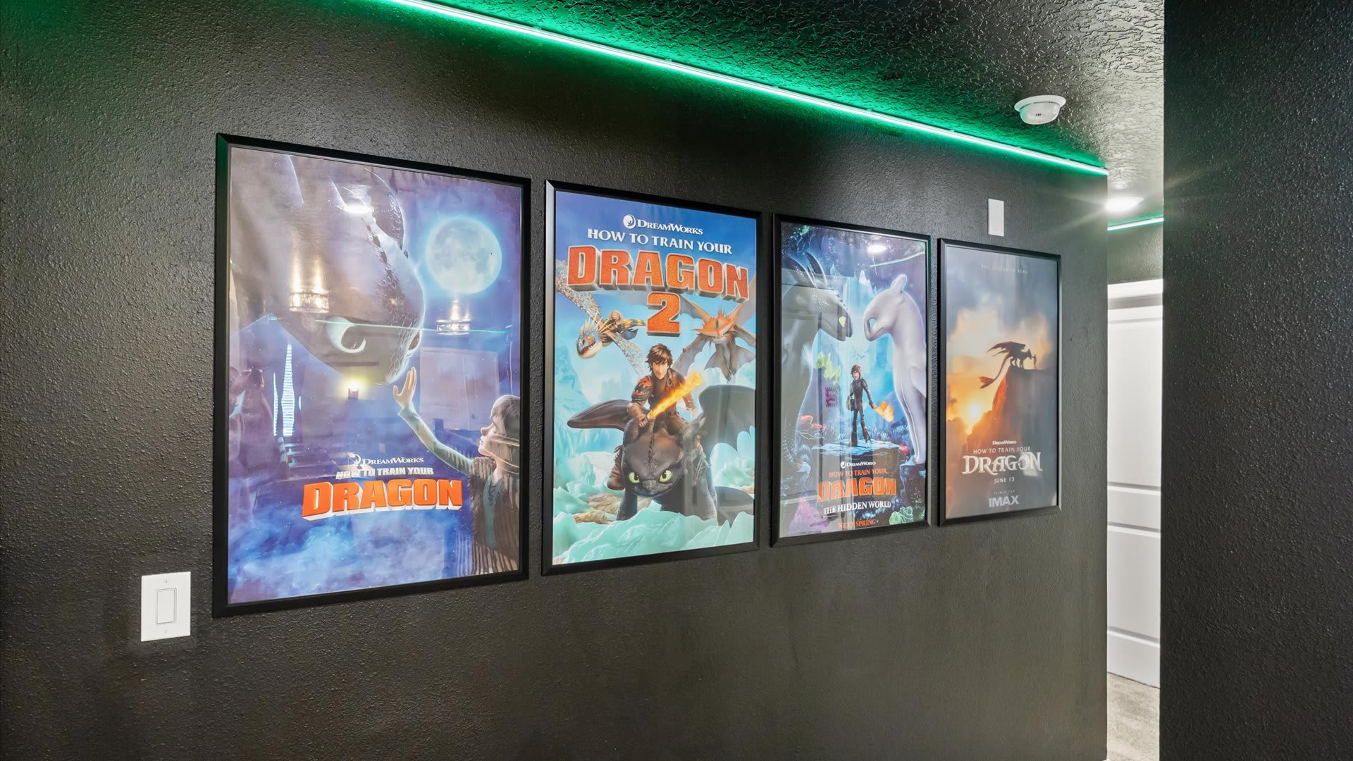 In-home cinema with large projector screen and tired seating