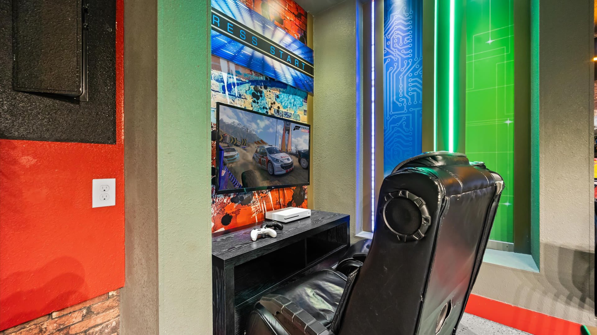 Games room with arcade games and billiards table