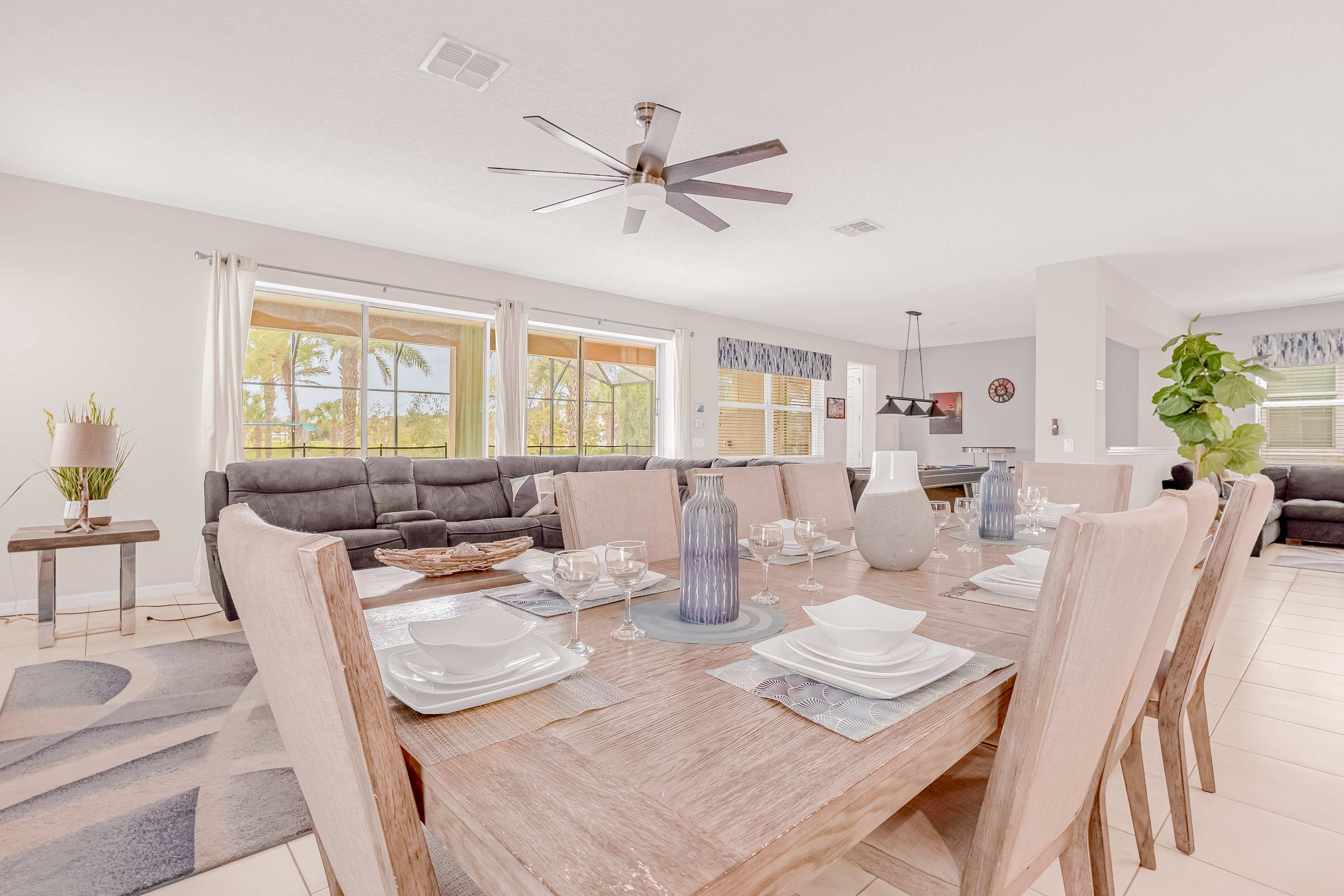 Elegant dining space with ample seating and natural light, perfect for family gatherings and entertaining.