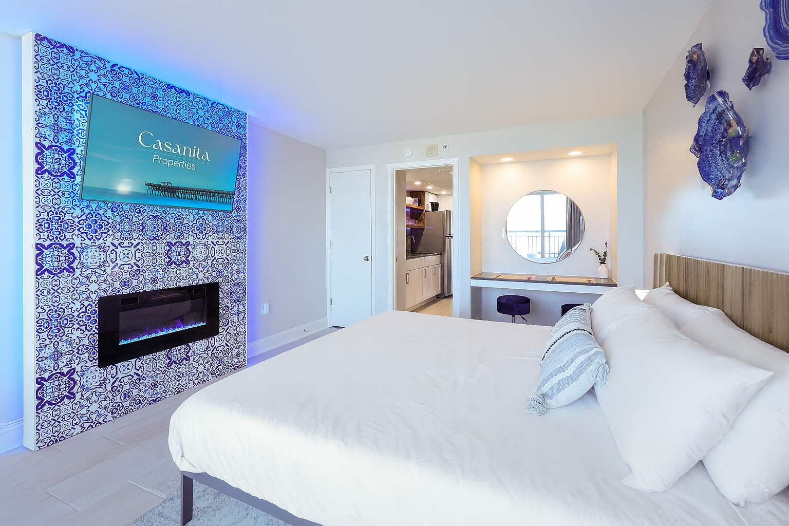 Experience coastal luxury in this stylish oceanfront suite—featuring a cozy electric fireplace, glam vanity, and beachy vibes throughout. The perfect blend of comfort, elegance, and unforgettable views awaits!
