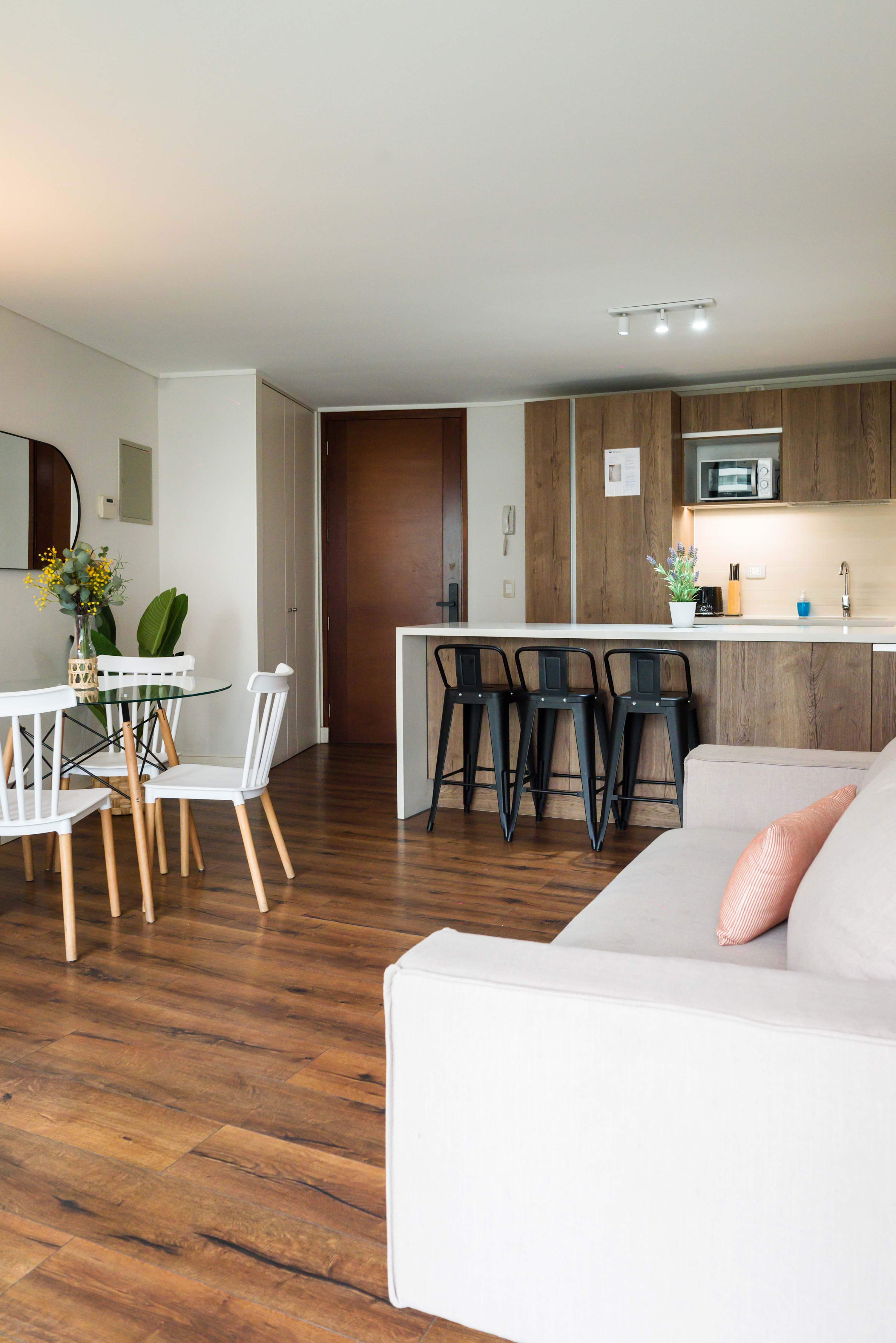 Chic and cozy living space with modern amenities and stylish decor, perfect for a relaxing stay.