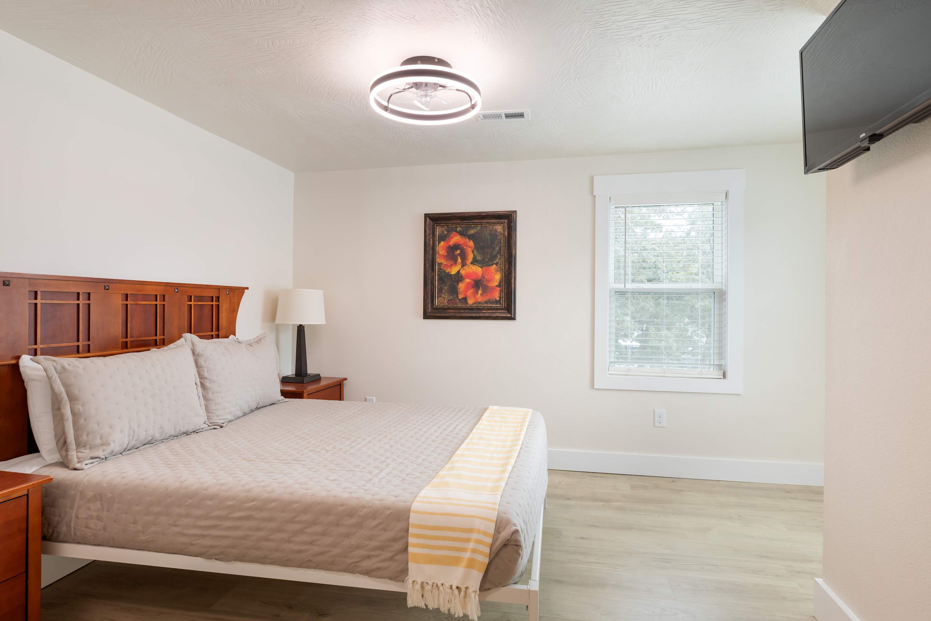 Bedroom 2 with queen bed and view of Table Rock Lake