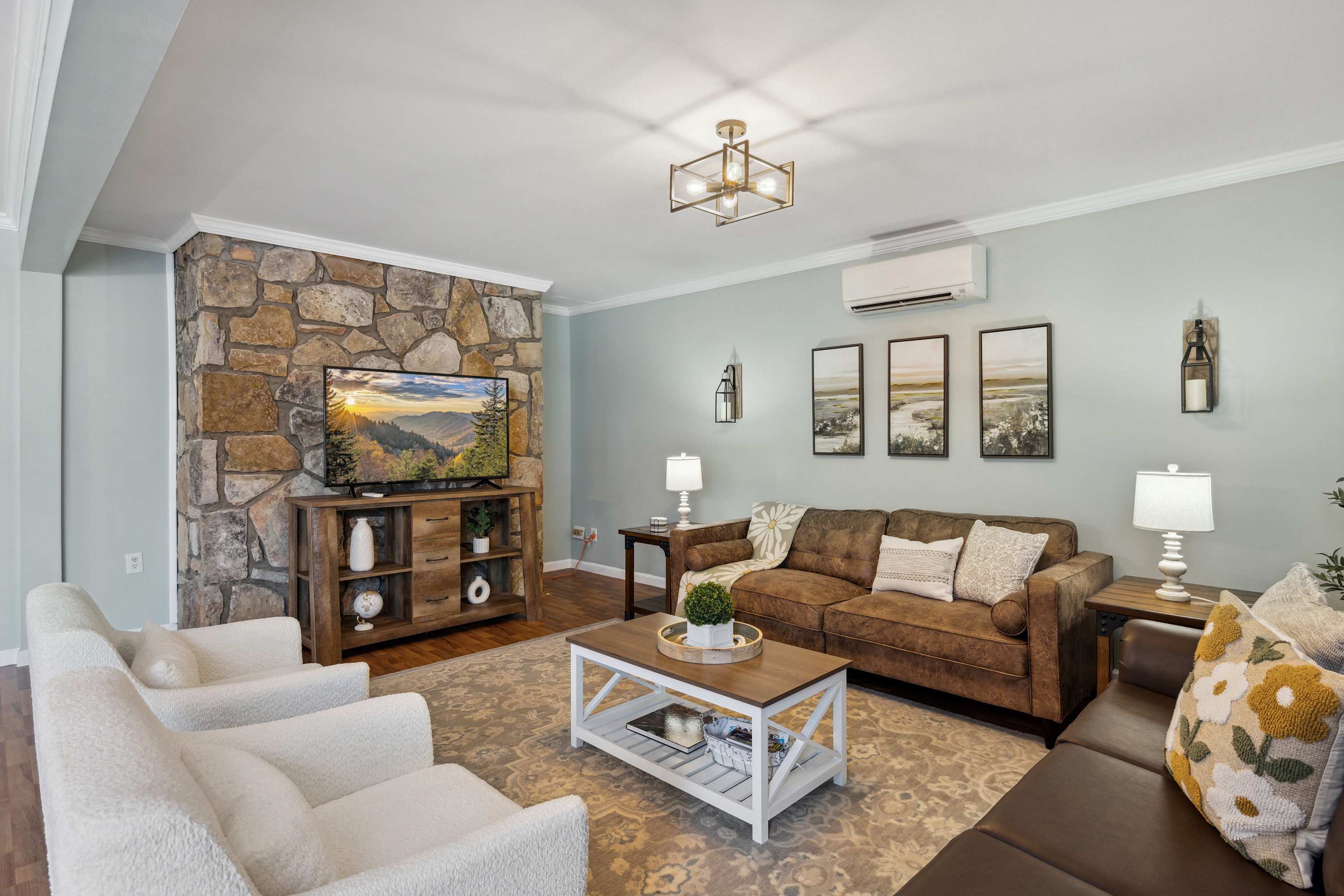 Chic living room with smart TV and sofa bed