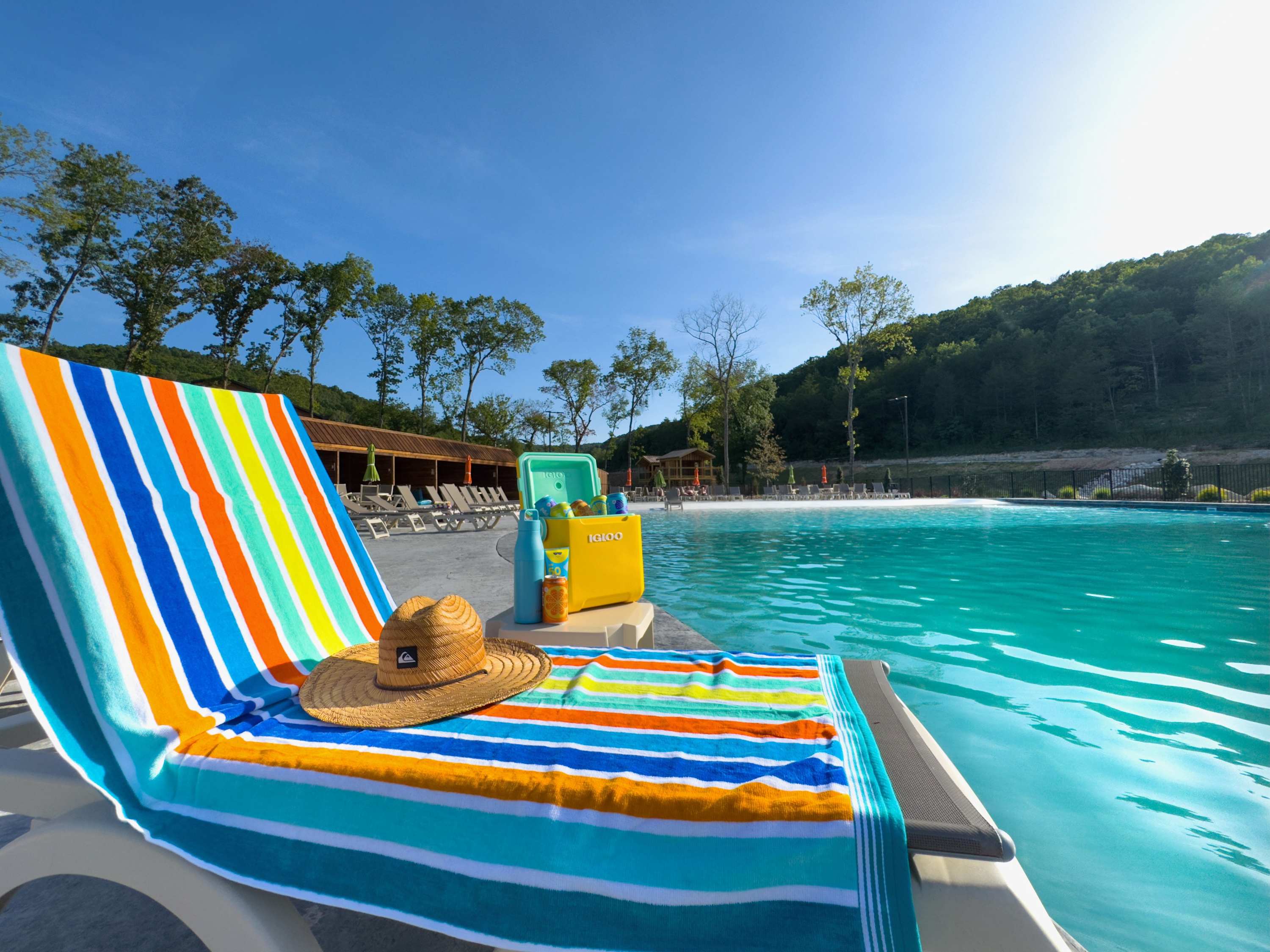 Lounge, float, or relax with your favorite refreshments and wooded views all around.