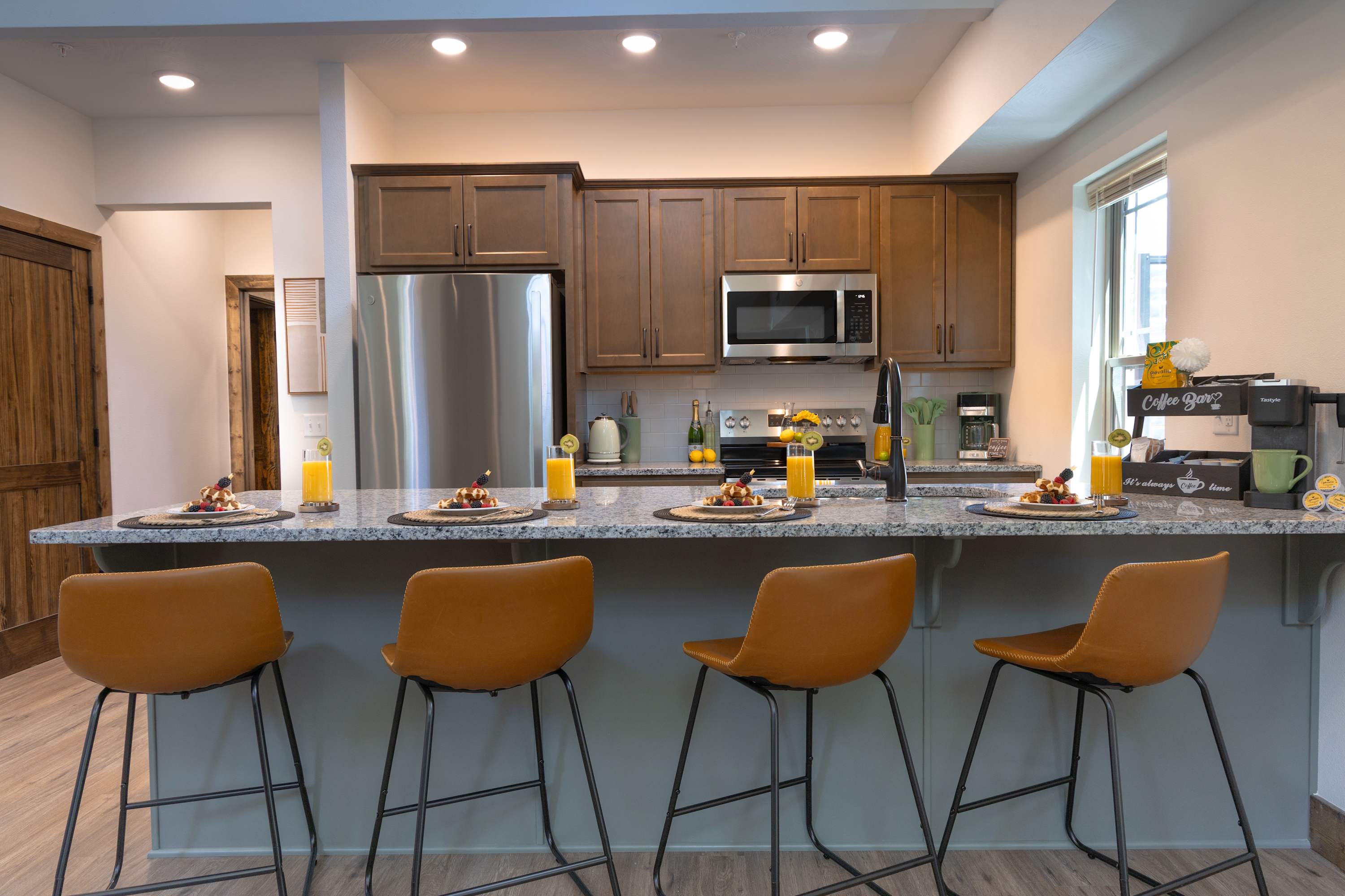 Start your mornings or gather for evening chats at the beautiful kitchen bar, where seating for six makes it easy to sip, snack, and stay connected in comfort and style.
