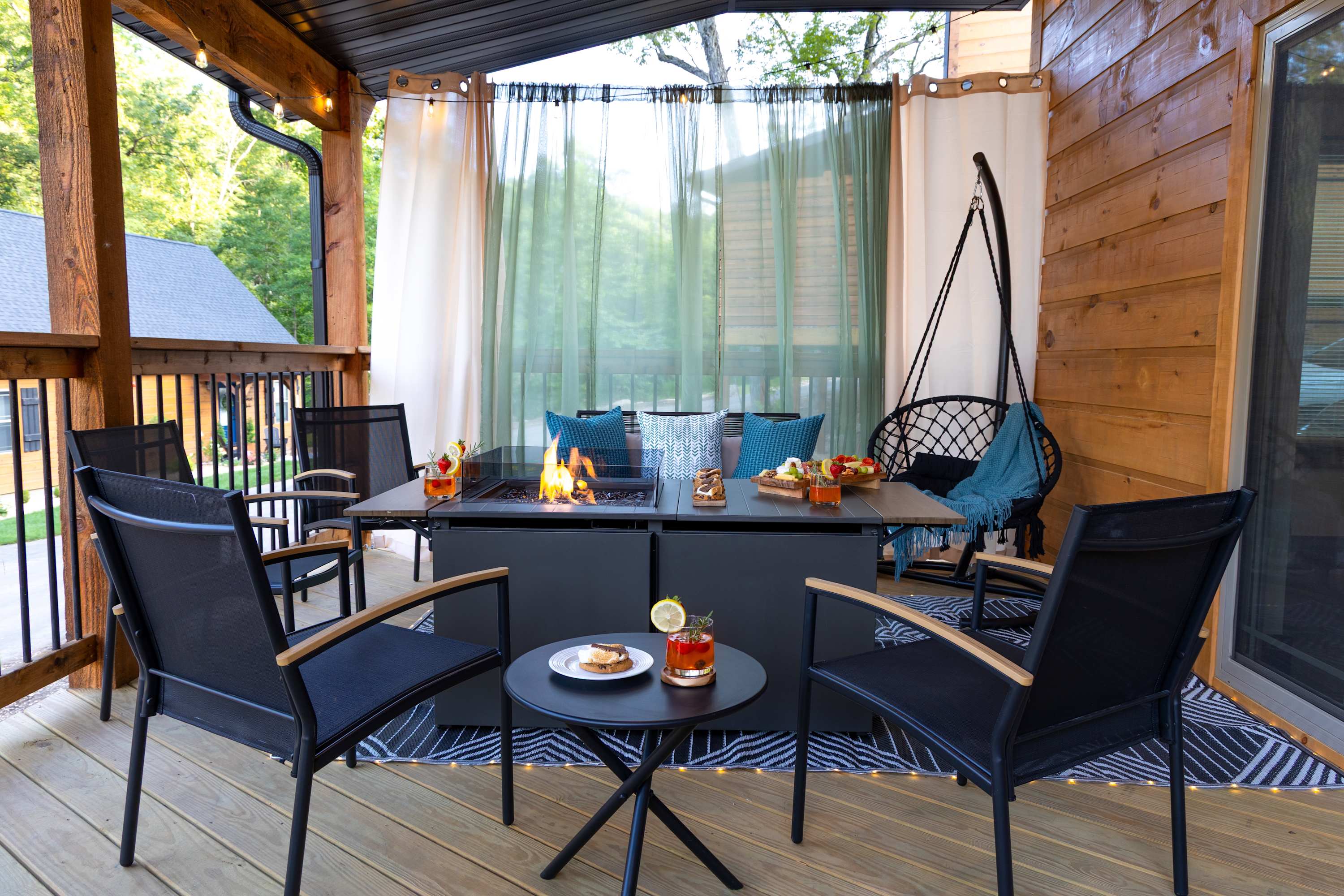 Unwind on the patio, where seating for six surrounds a crackling firepit—ideal for roasting s’mores, sipping cocktails, and swapping stories under the stars. An LED-lit outdoor rug adds the perfect touch of ambiance, turning every evening into a memo
