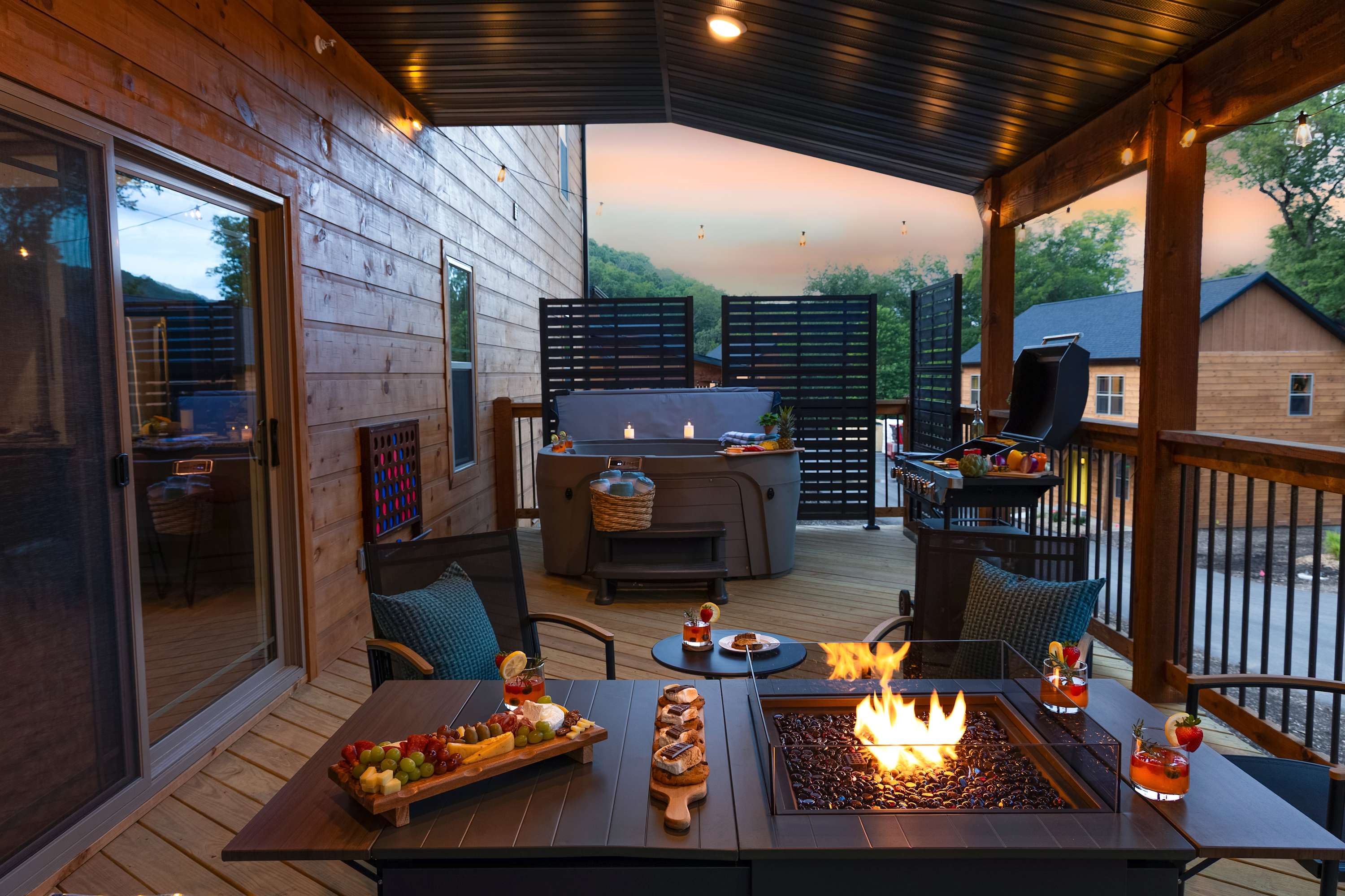 Adventure's Edge has a spacious private deck, copmlete with a hot tub, and is surrounded by towering trees and the calming sounds of nature.