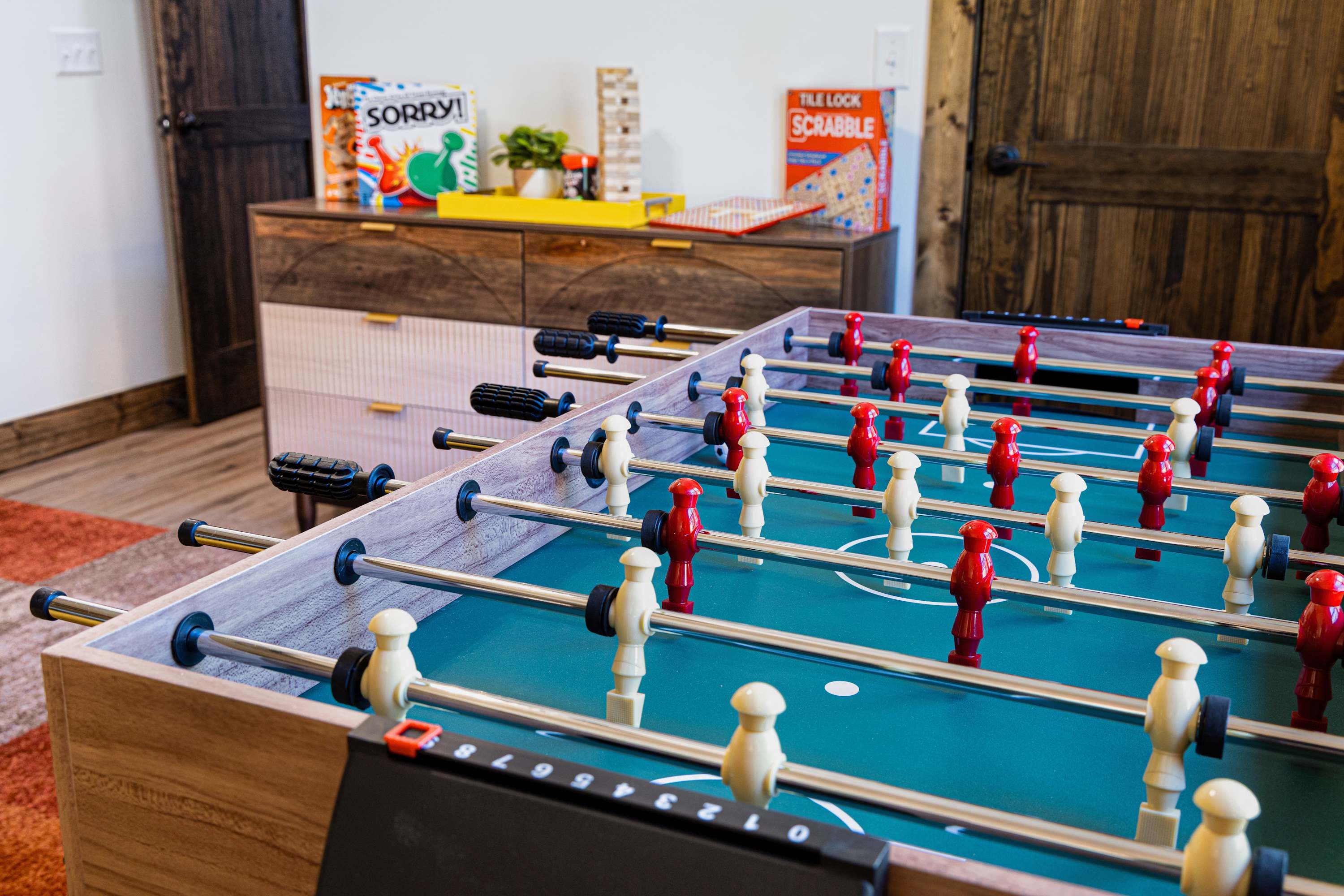 The bunk room more than just a place to sleep—it's an entertainment hub in its own right.