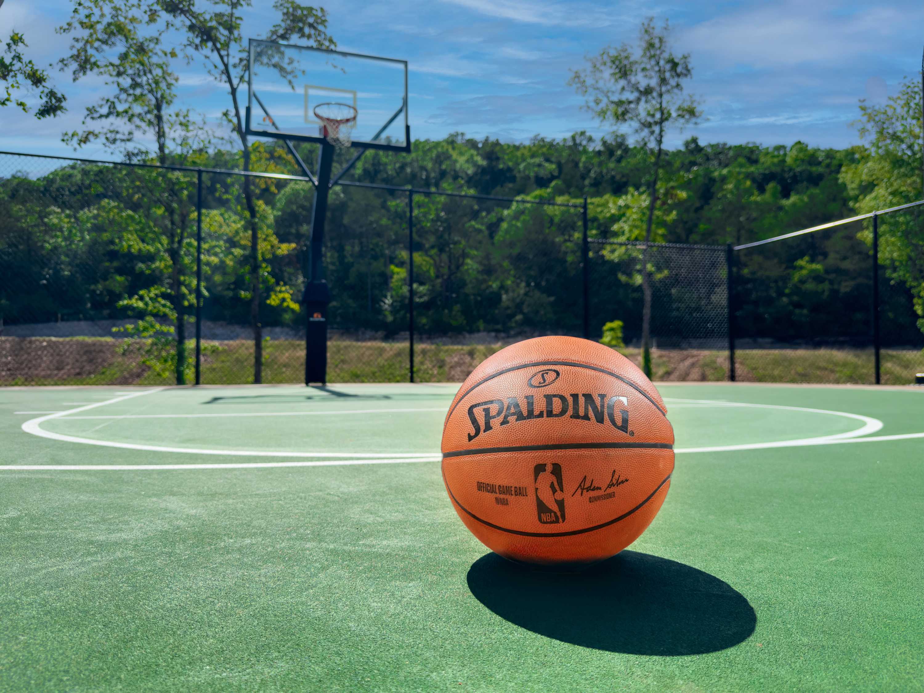 Shoot hoops just steps from your cabin—balls provided, fun guaranteed!