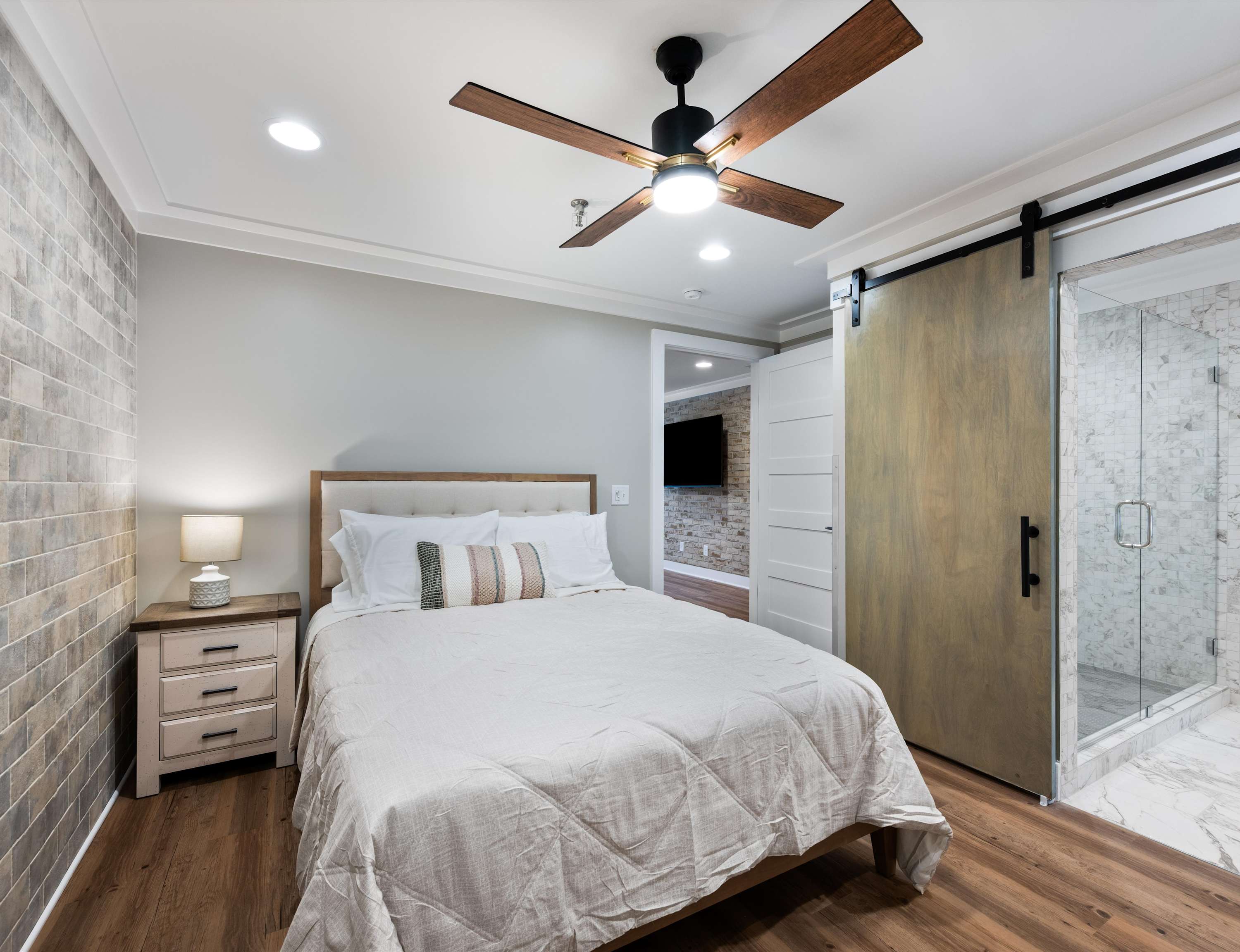 Recharge in the chic queen suite, offering an updated ensuite bath