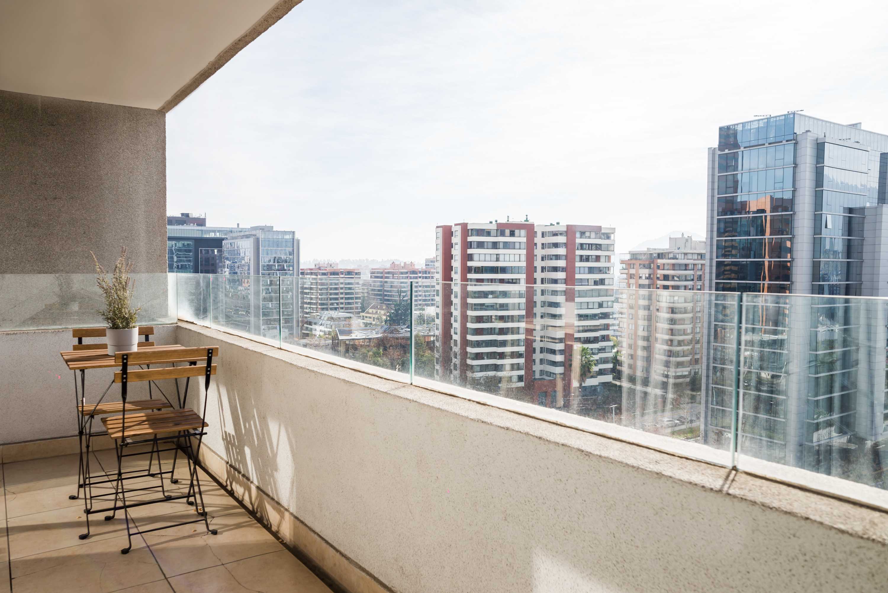Enjoy your morning coffee with stunning city views from this cozy private balcony.