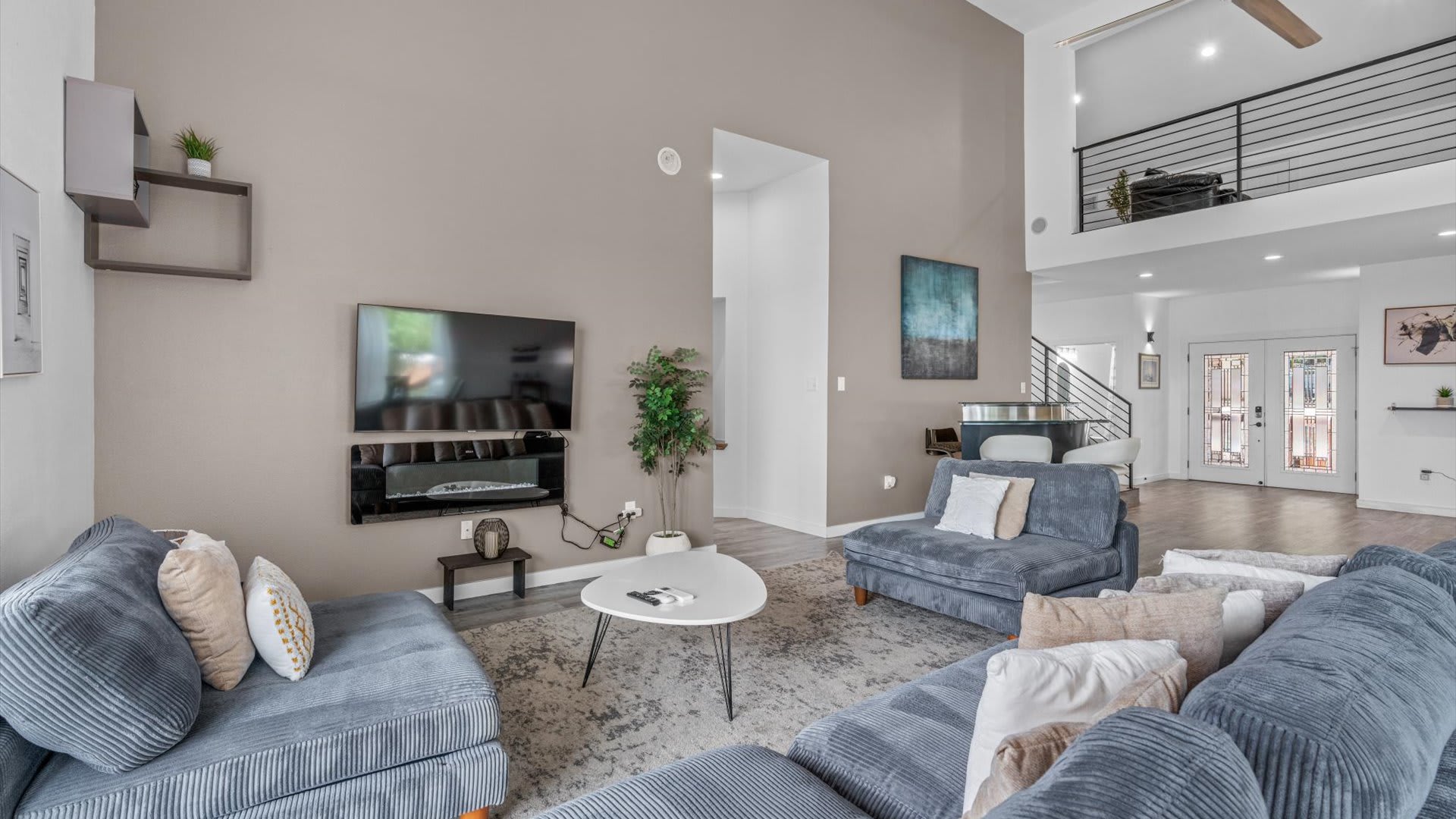 Contemporary living room with a smart TV and high speed internet