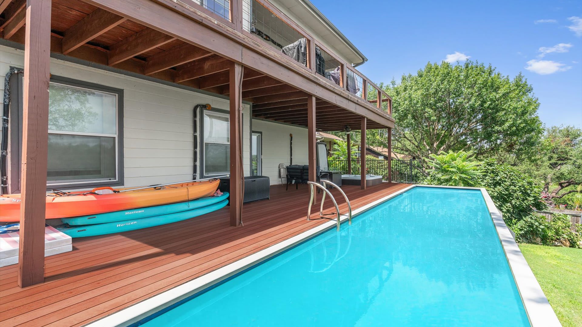Private swimming pool with sun deck views
