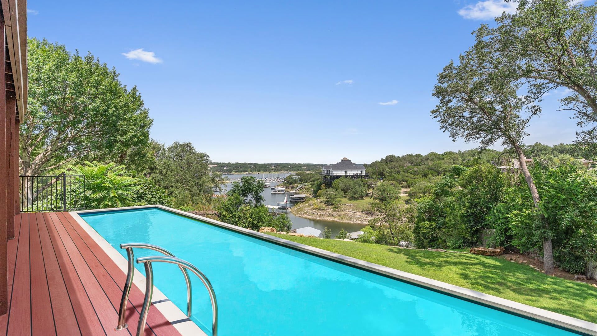 Private swimming pool with sun deck views