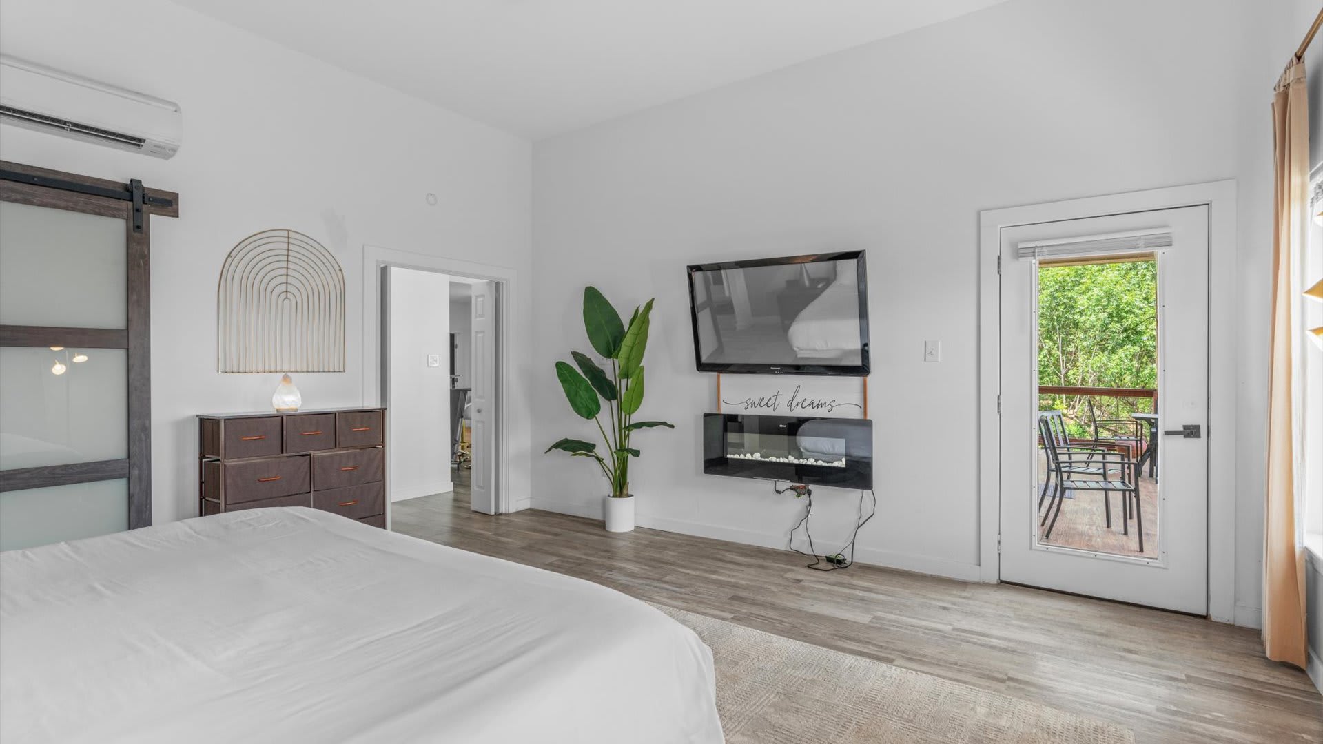 King bedroom with smart TV and en-suite bathroom