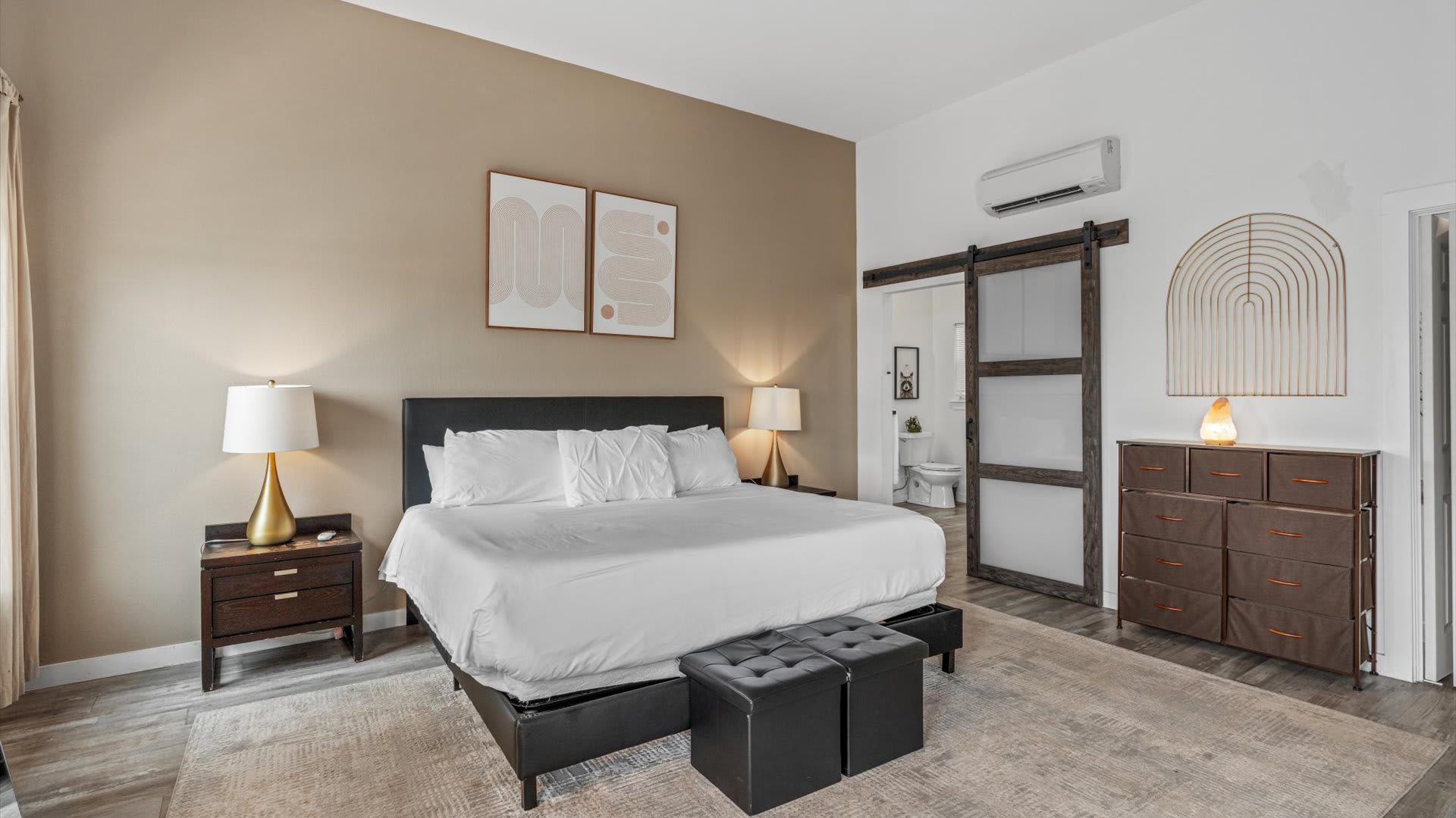 King bedroom with smart TV and en-suite bathroom