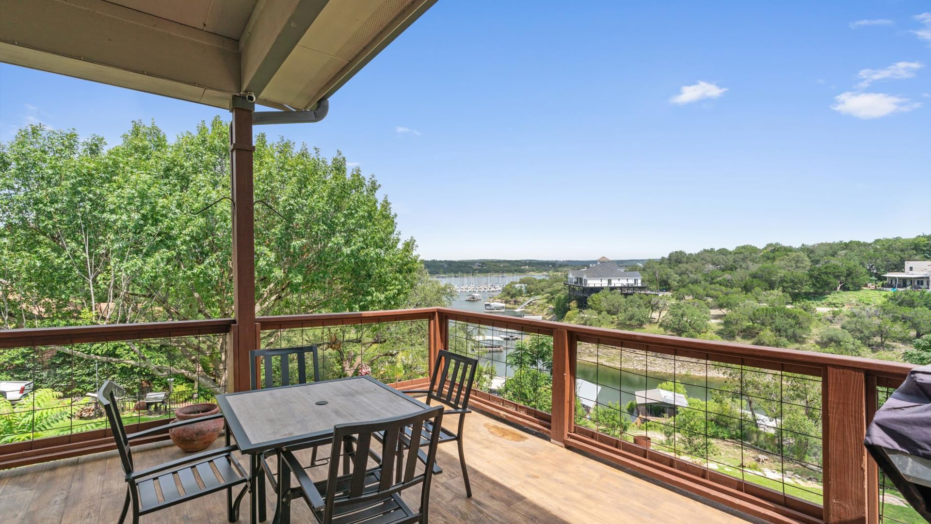 Outdoor patio and sundeck with dining area