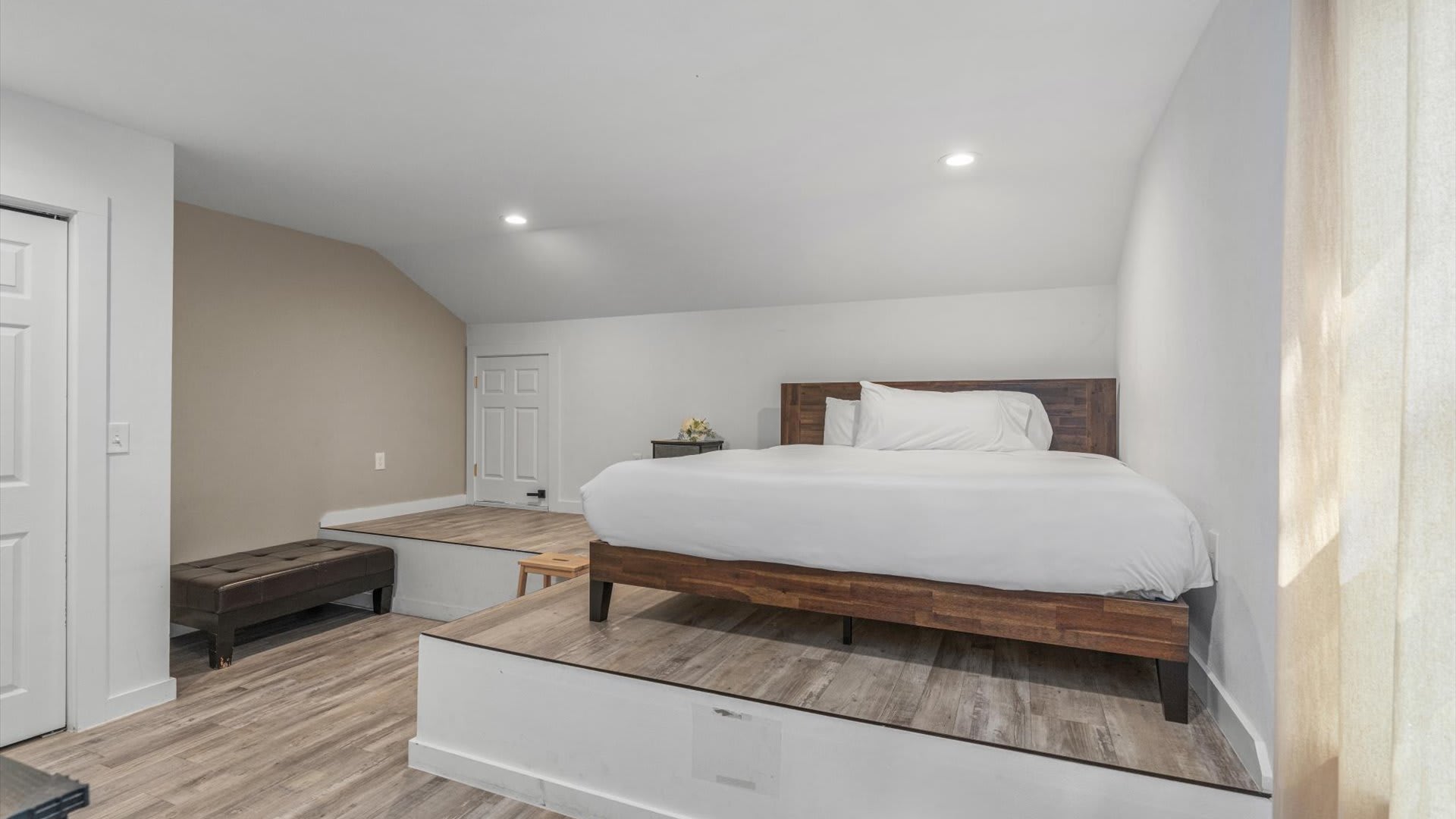 High rise king bedroom with fresh linens