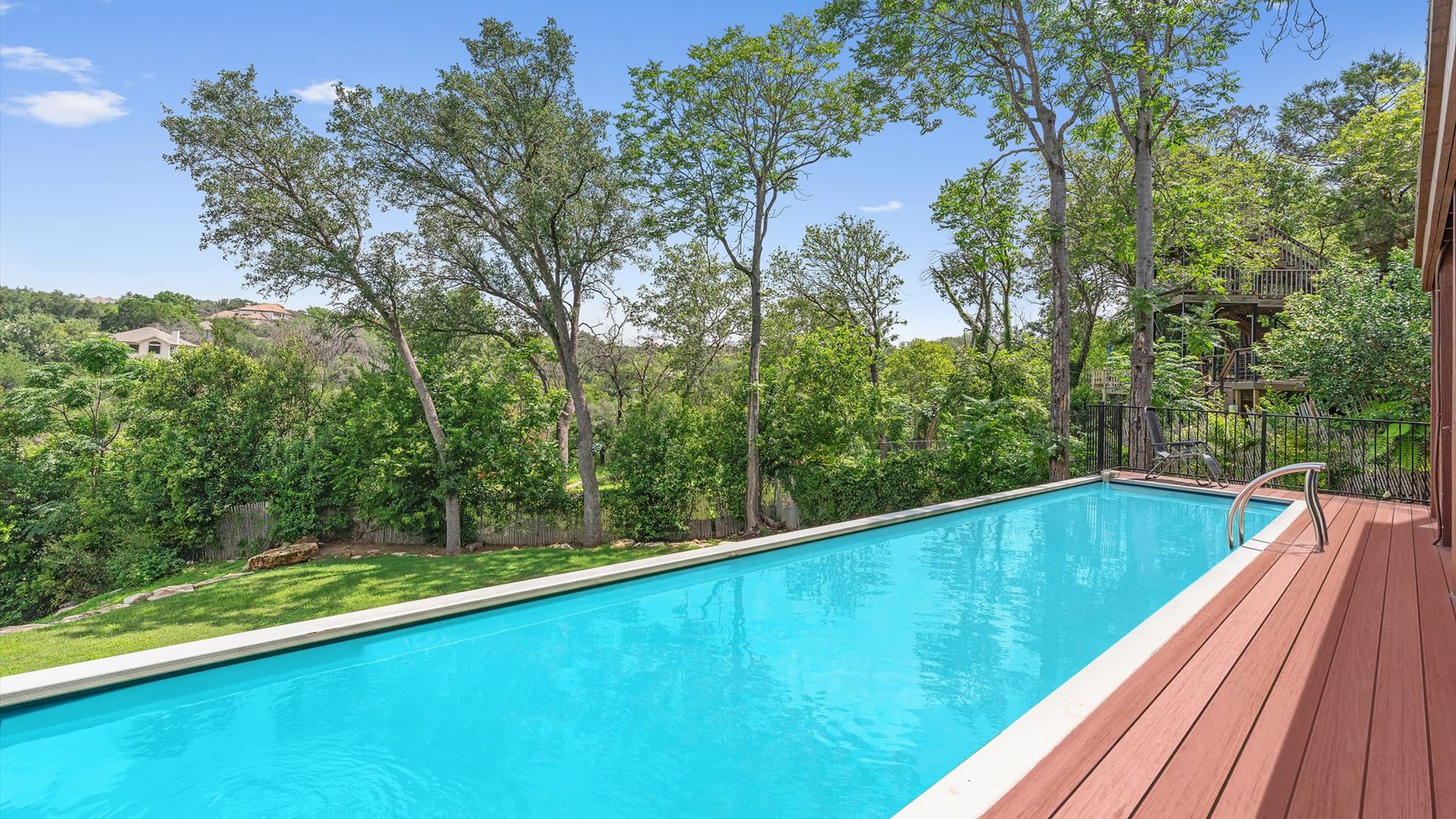 Private swimming pool with sun deck views