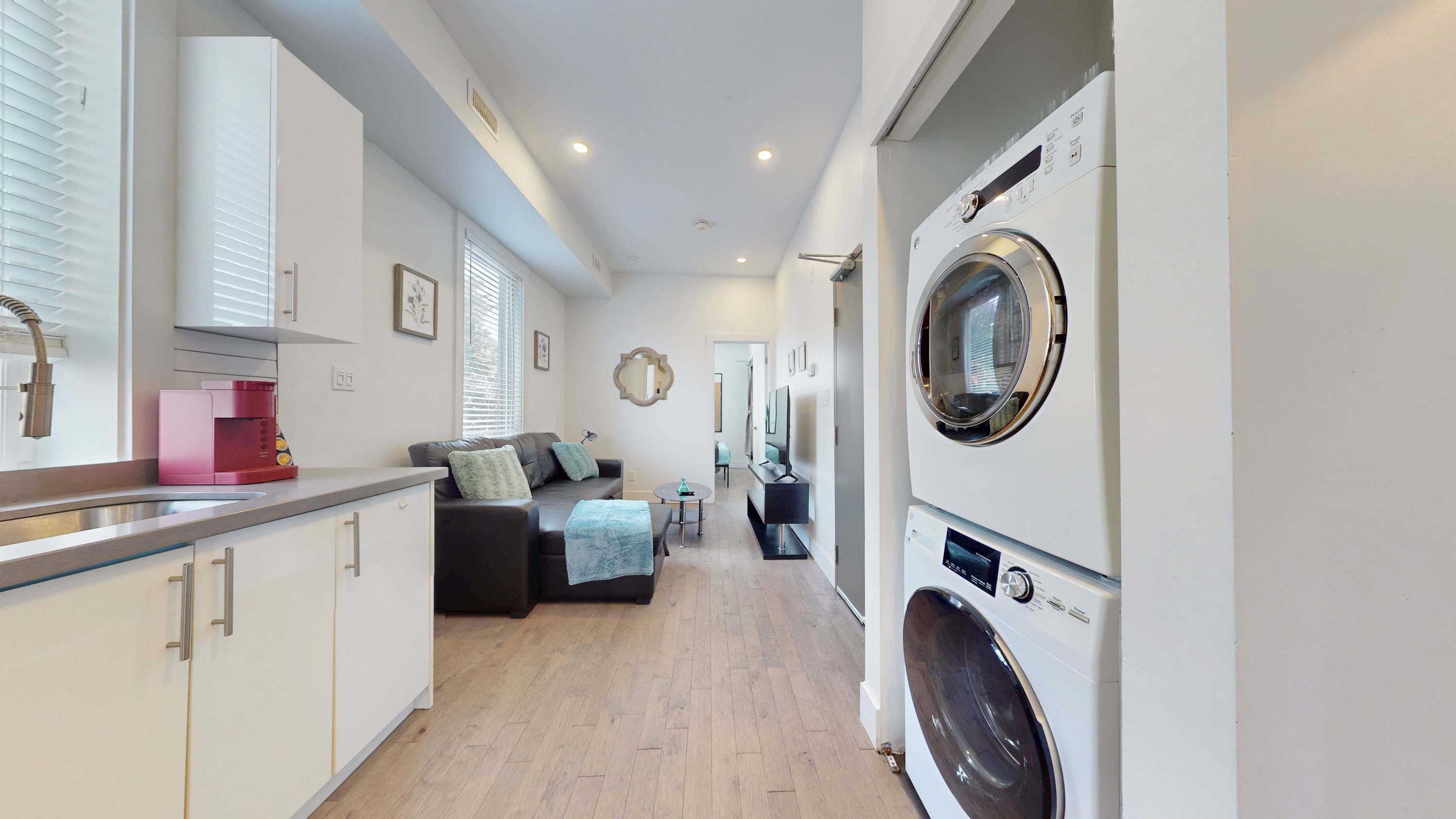 Kitchen area and in-suite laundry facilities (washer and dryer)
