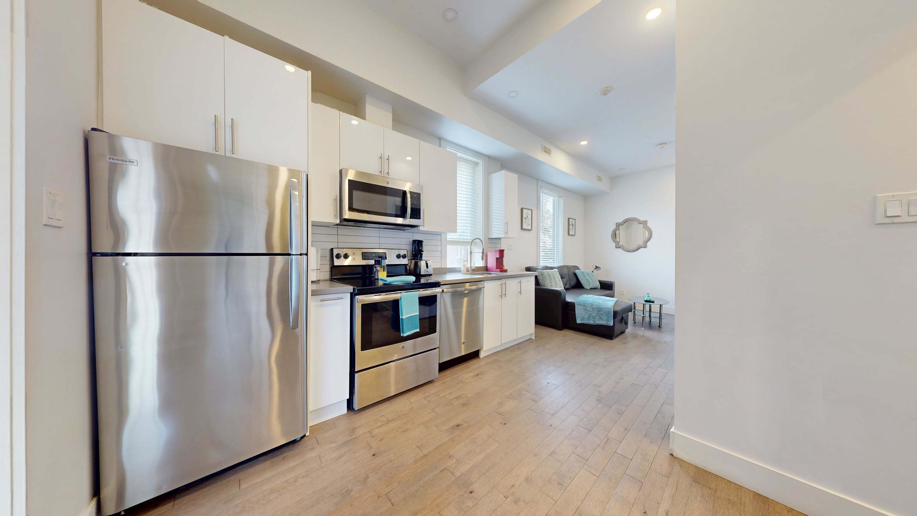 Kitchen area with silver appliances