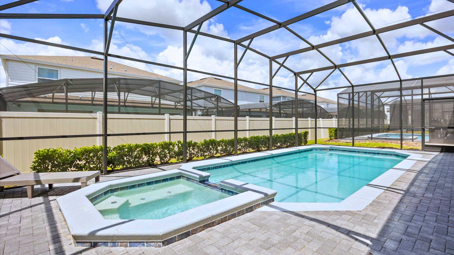 Private screened-in swimming pool and hot tub 