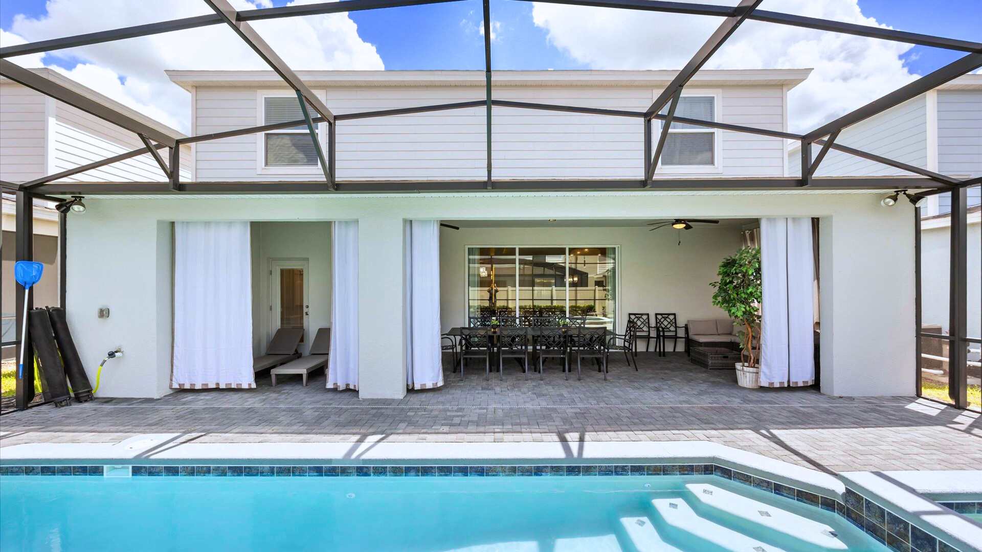 Private screened-in swimming pool and outdoor patio