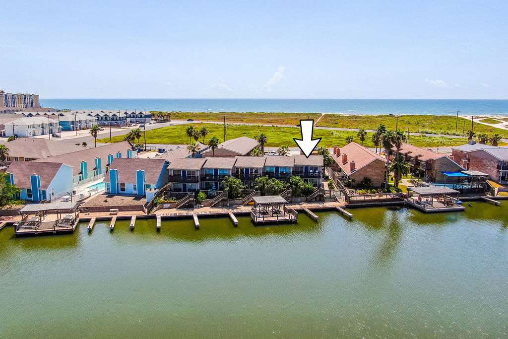 Scoop Deck | Dock, Pool & Balcony Views — Corpus Christi, TX — vacation rental