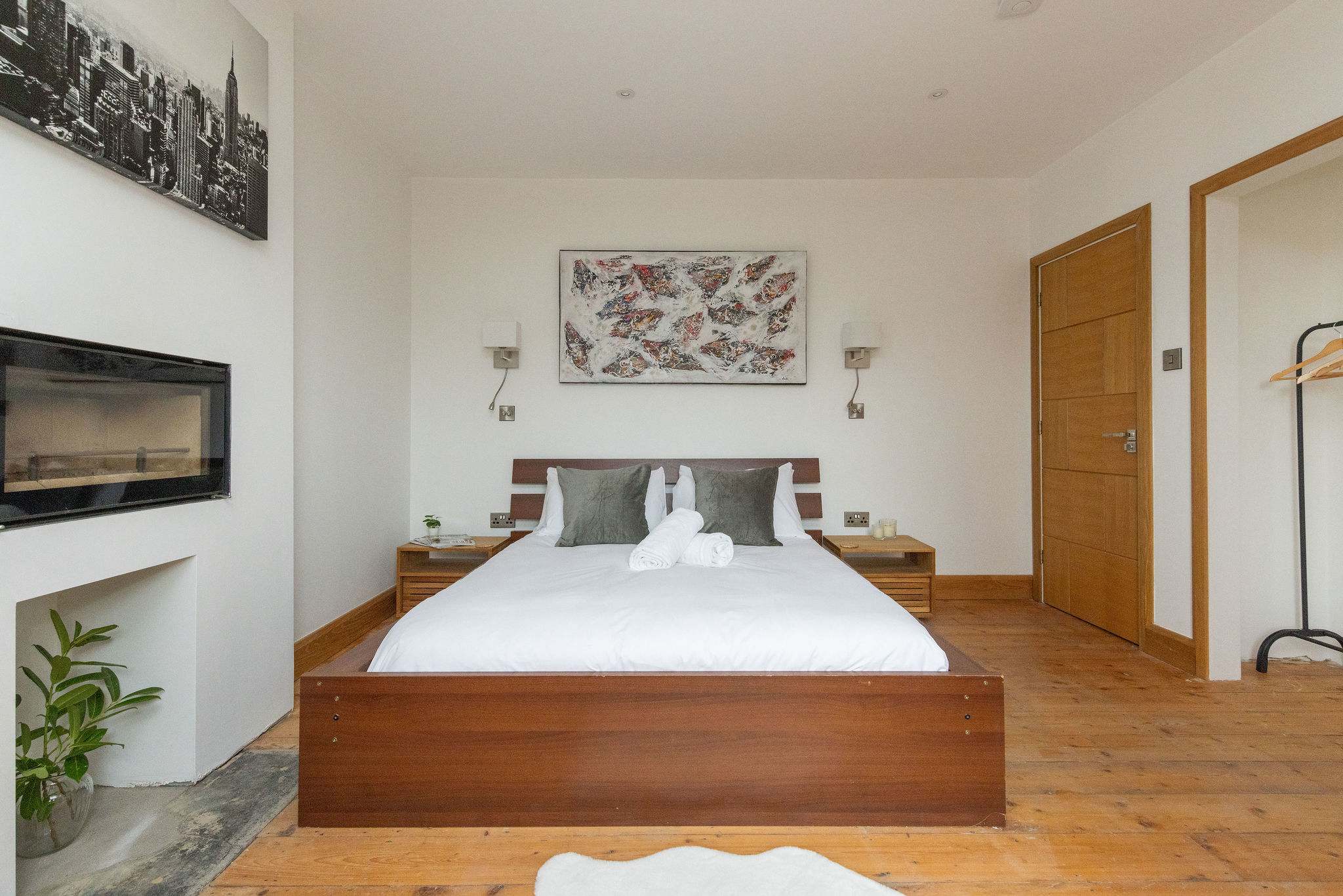 One of the 4-bedrooms in this mid terrace property.