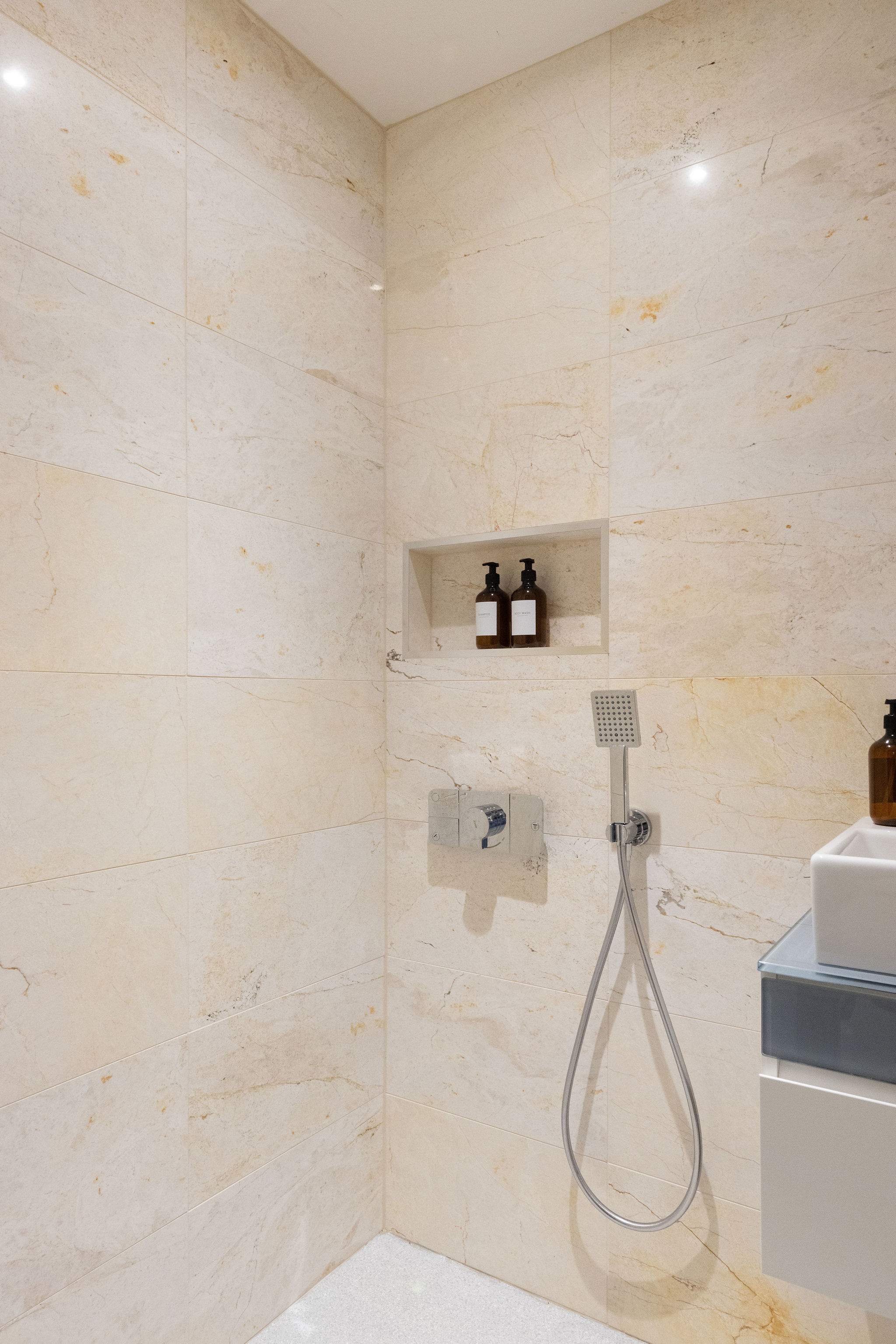 Bedroom 4- A small shower room with handheld shower accompanies this bathroom.