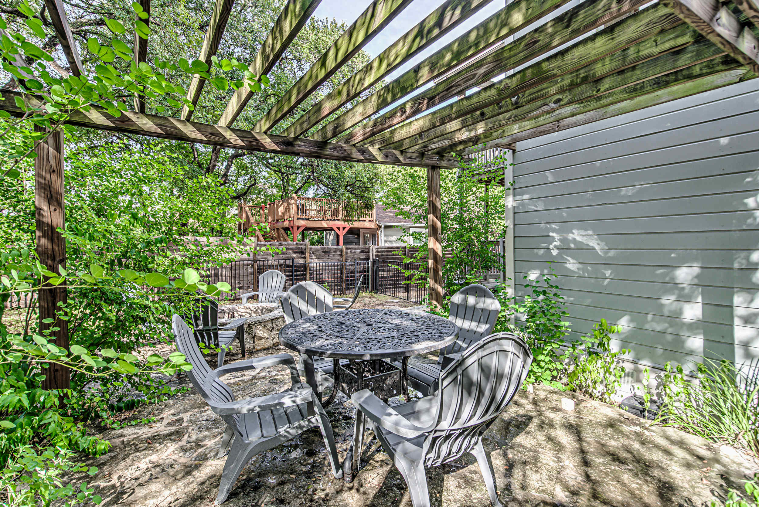 Dine al fresco under the shaded arbor!