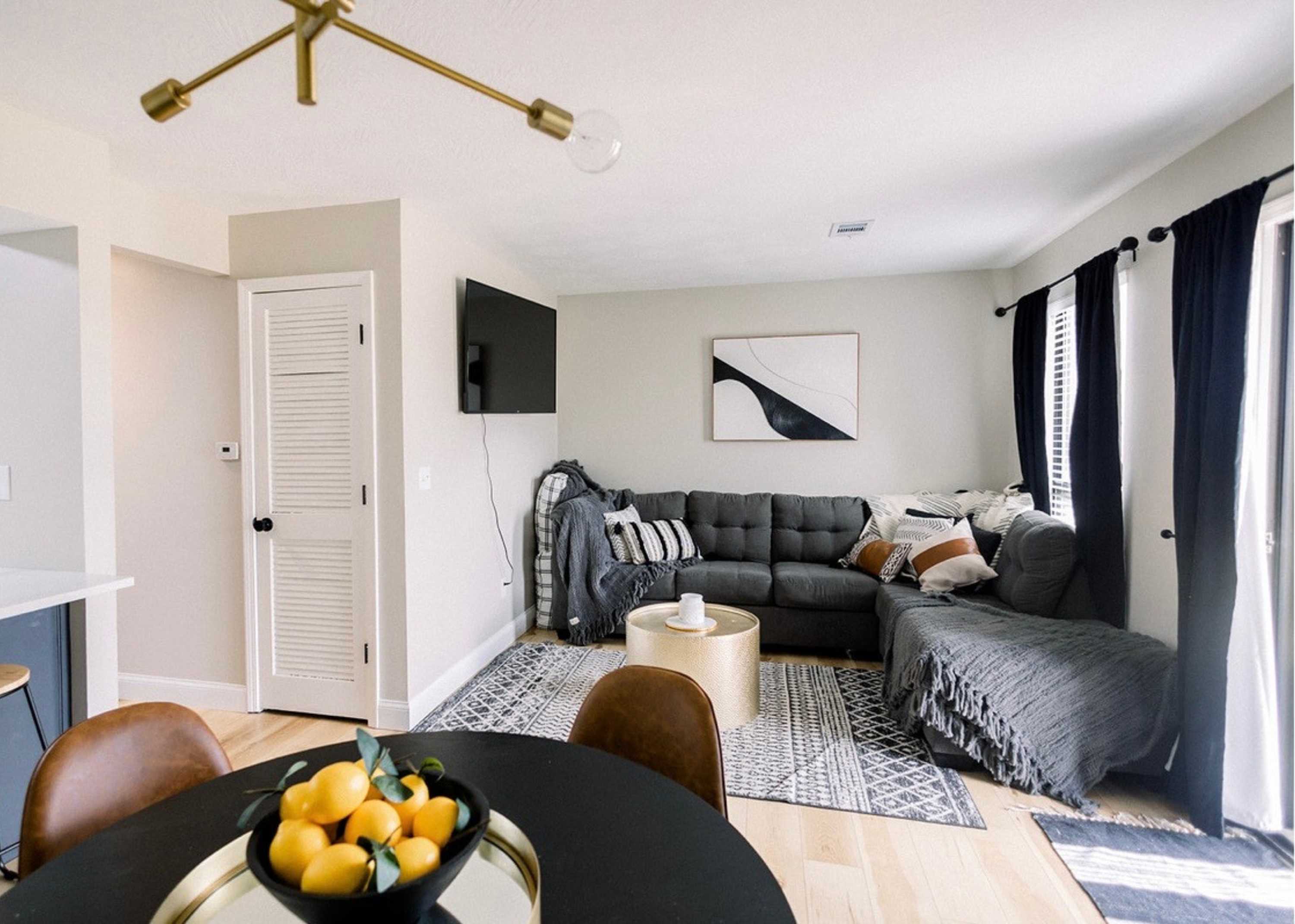 Curl up in the chic living room & stream your favorites on the smart TV​